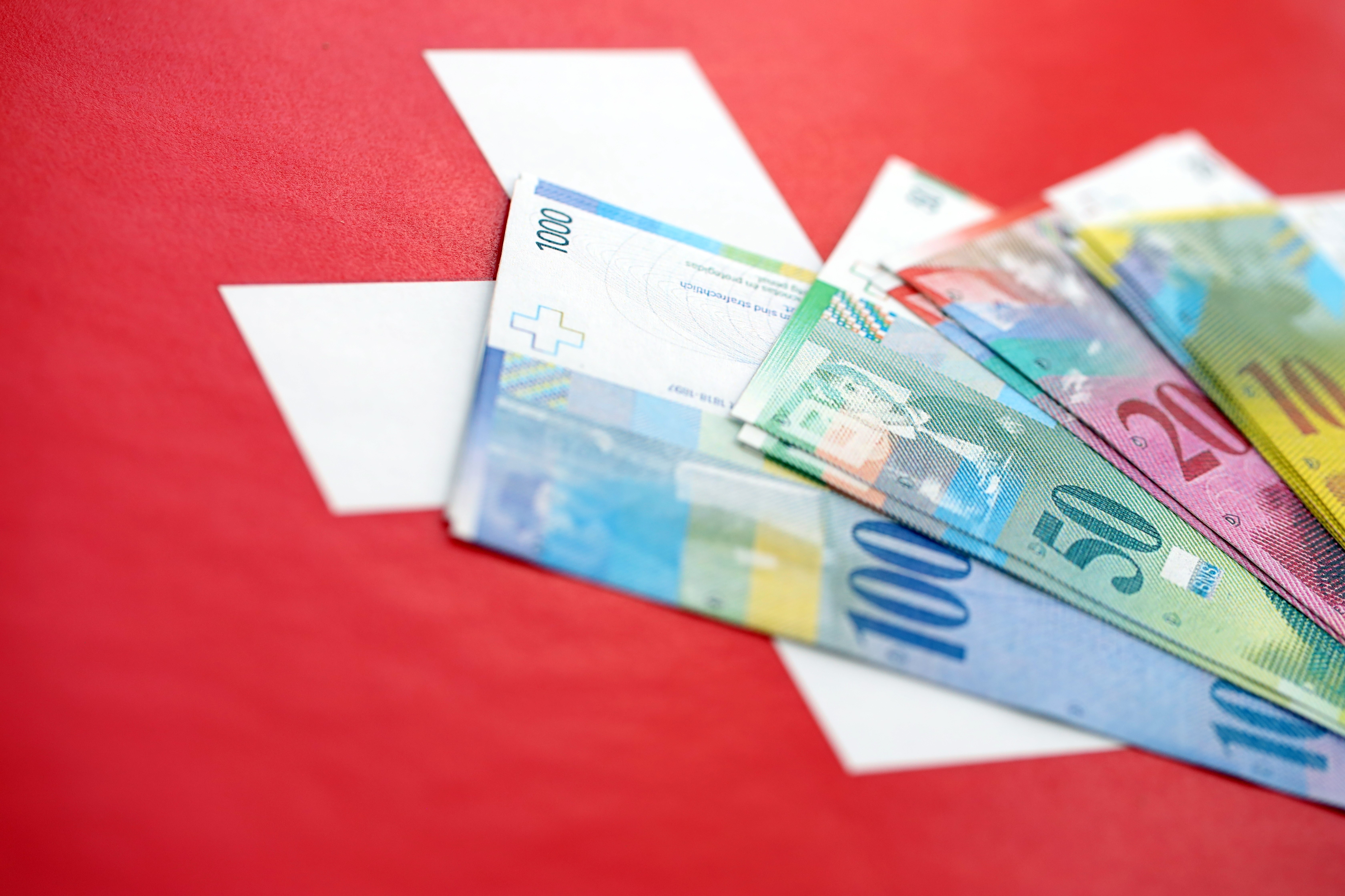 swiss flag and francs