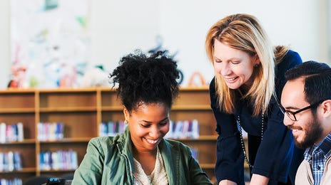 Group of students and their instructor talking during their English class in Berlitz Algiers