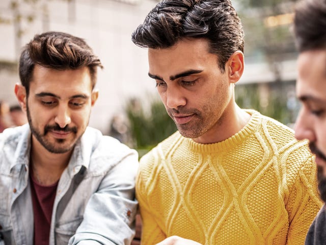 Student holding a tablet and learning Japanese together with Berlitz