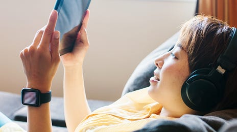 Girl learning a language with Berlitz Flex on her tablet