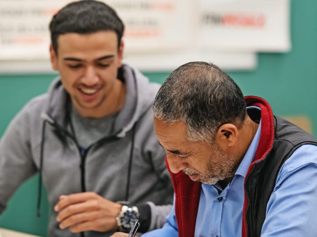 Students making notes and preparing for their language assessment with Berlitz Algeria