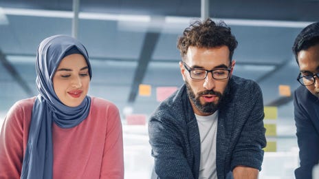 Students listening to their instructor during an intensive English class at Berlitz Algeria