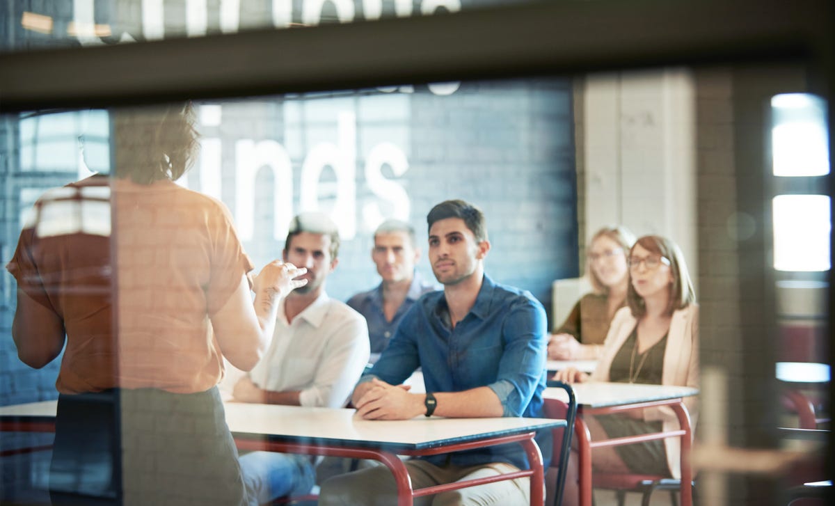 Group of students focusing on their instructor during their intensive French class