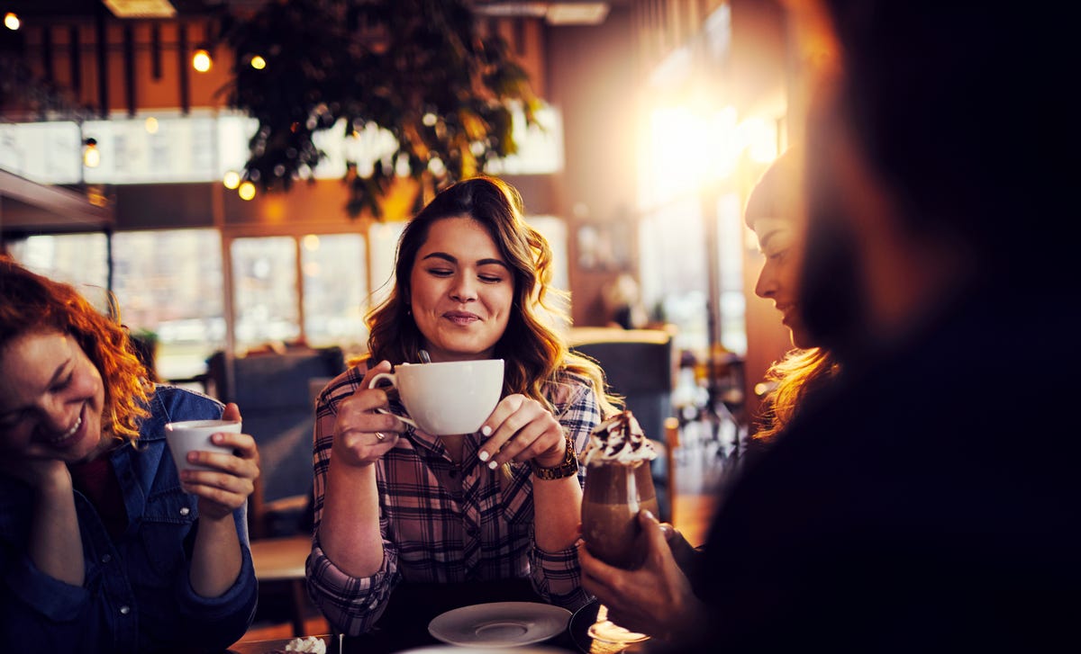 Students in a coffeeshop drinking a coffee after finishing their language class at Berlitz Algeria