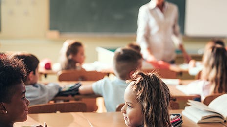 Two kids talking to each other in German during their course with Berlitz Algeria