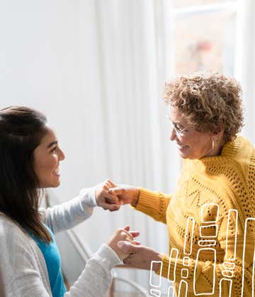 Granddaughter smiling and holding hands with her grandmother with St. Luke's Health Plan enjoy the ease of being a part of a complete network.