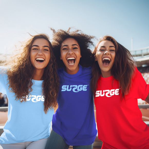 Girls in SURGE tshirts cheering