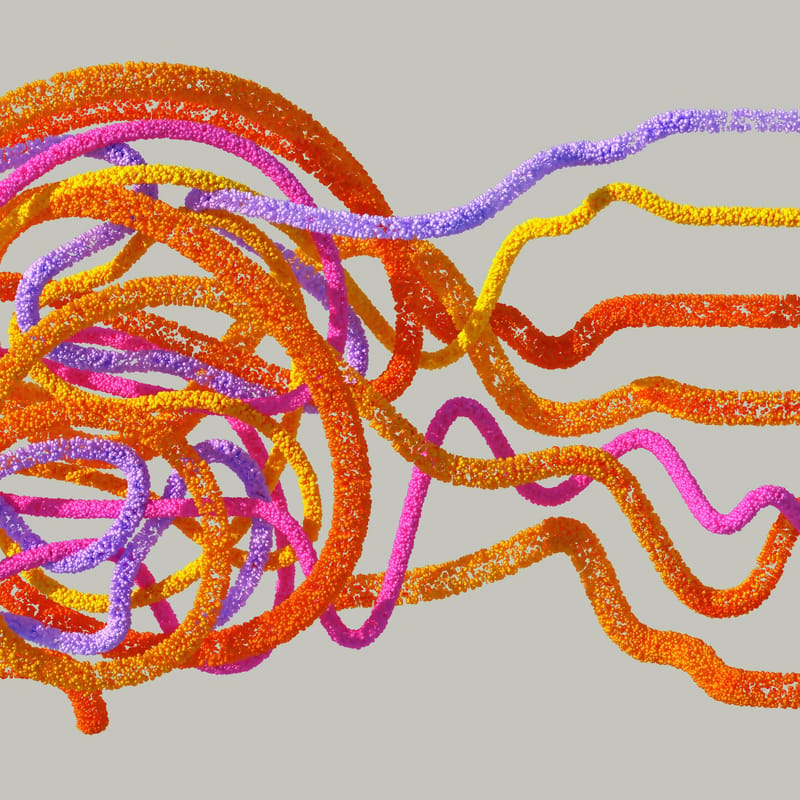 Ilustración de líneas de colores que forman una figura similar a un cerebro al cambiar de idioma, con trazos que se extienden hacia la derecha.