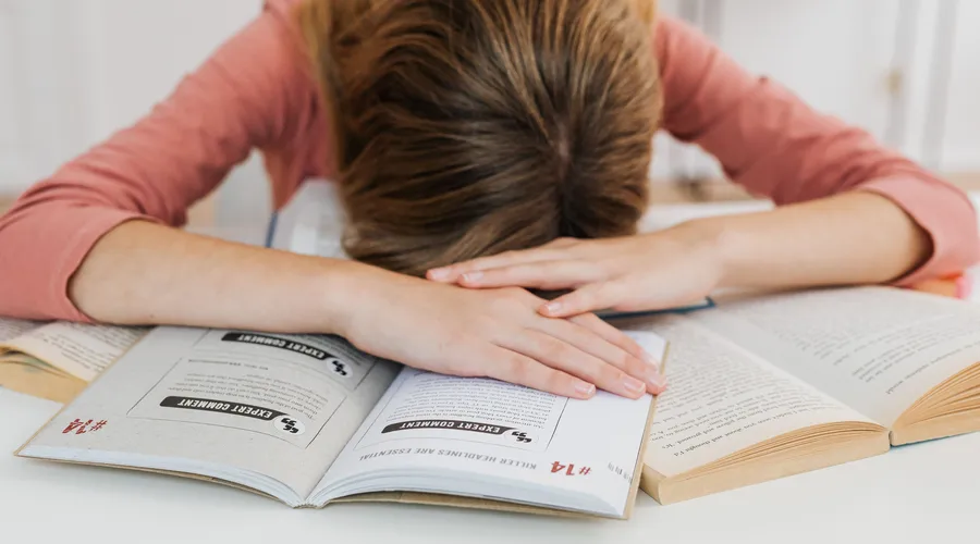 Adult studying on a laptop during a Berlitz online language-learning session.