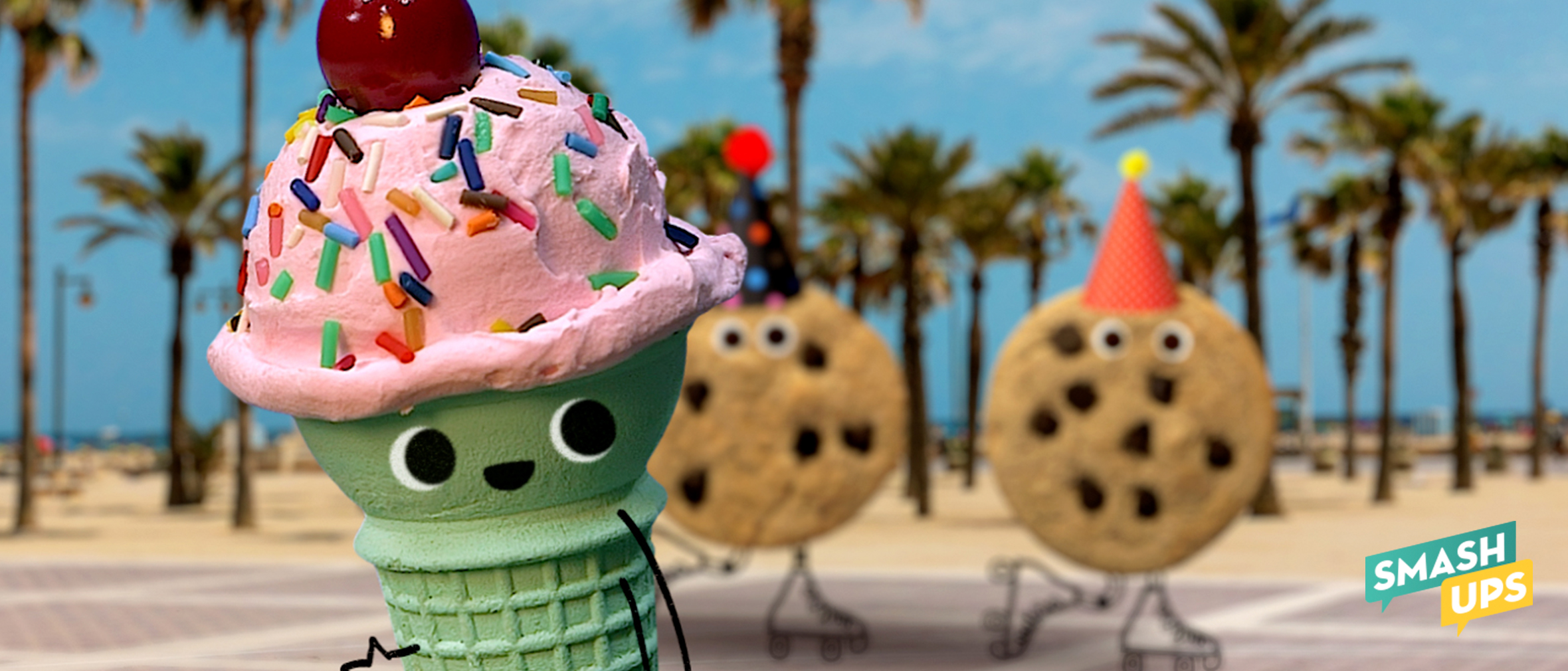 An ice cream cone with sprinkles dancing by the beach.