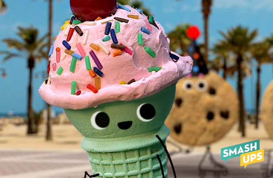 An ice cream cone with sprinkles dancing by the beach.
