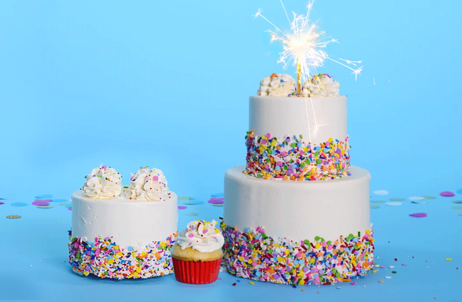 A birthday cake with a sparkling candle