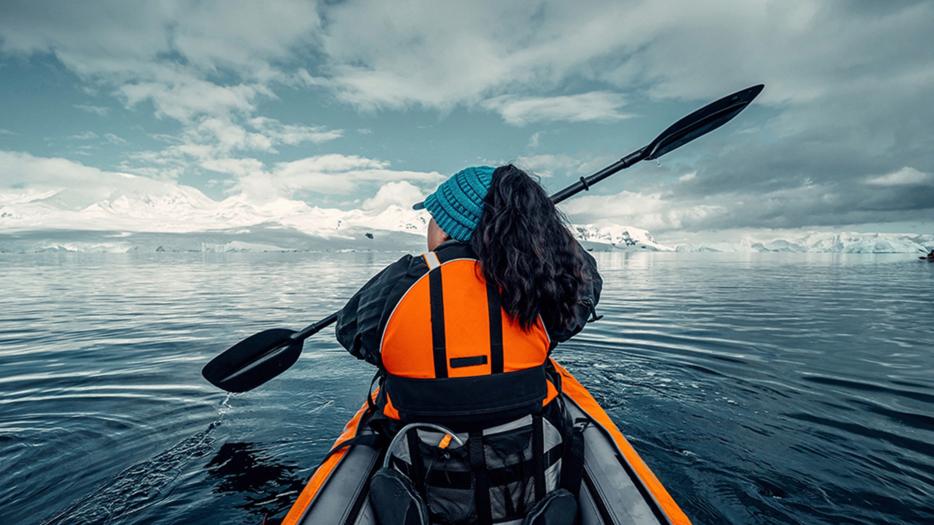 Person kayaking in Antarctica