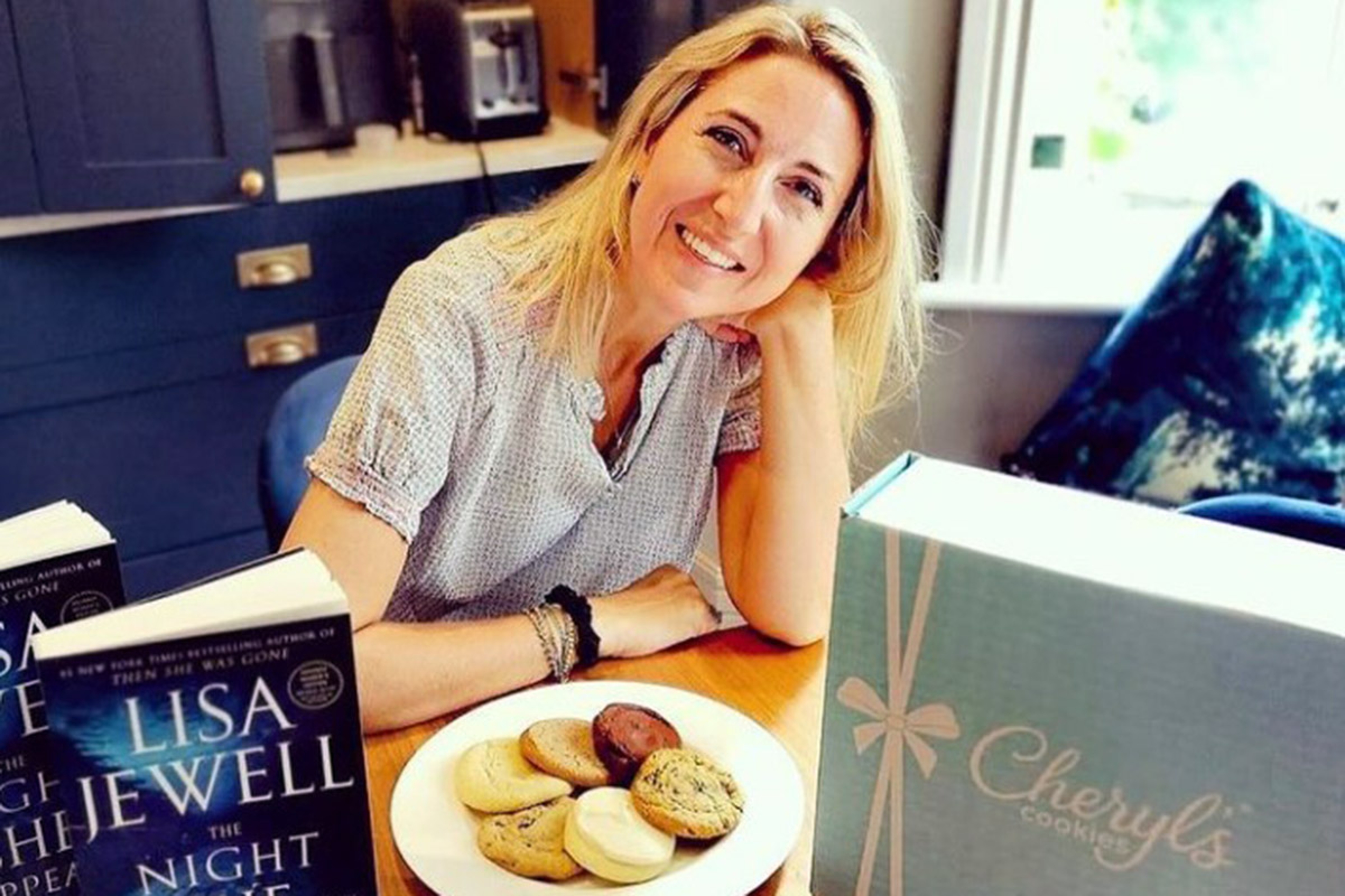 Lisa Jewell with her book The Night She Disappeared