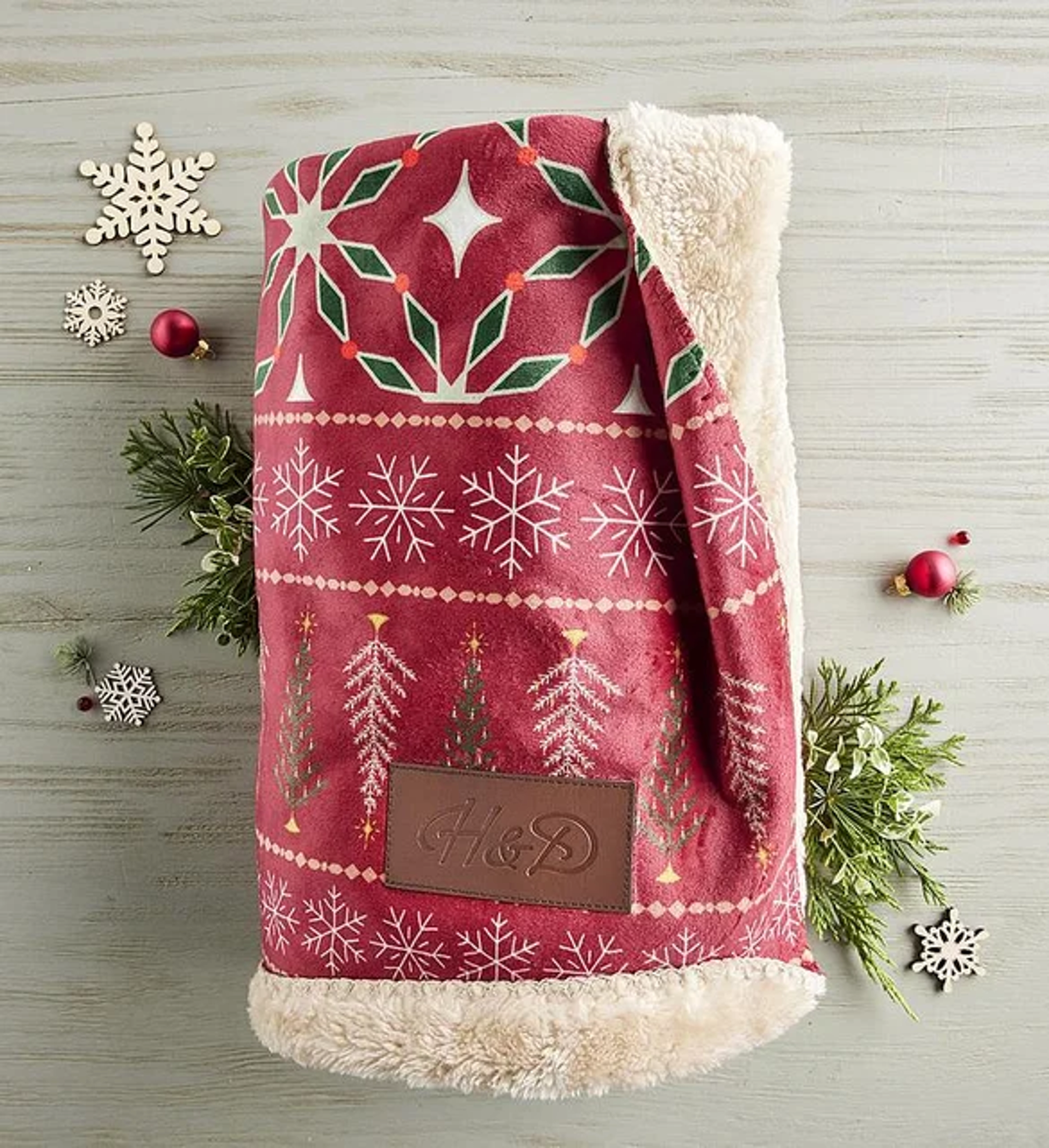 gifts under  festive throw blanket with sherpa lining