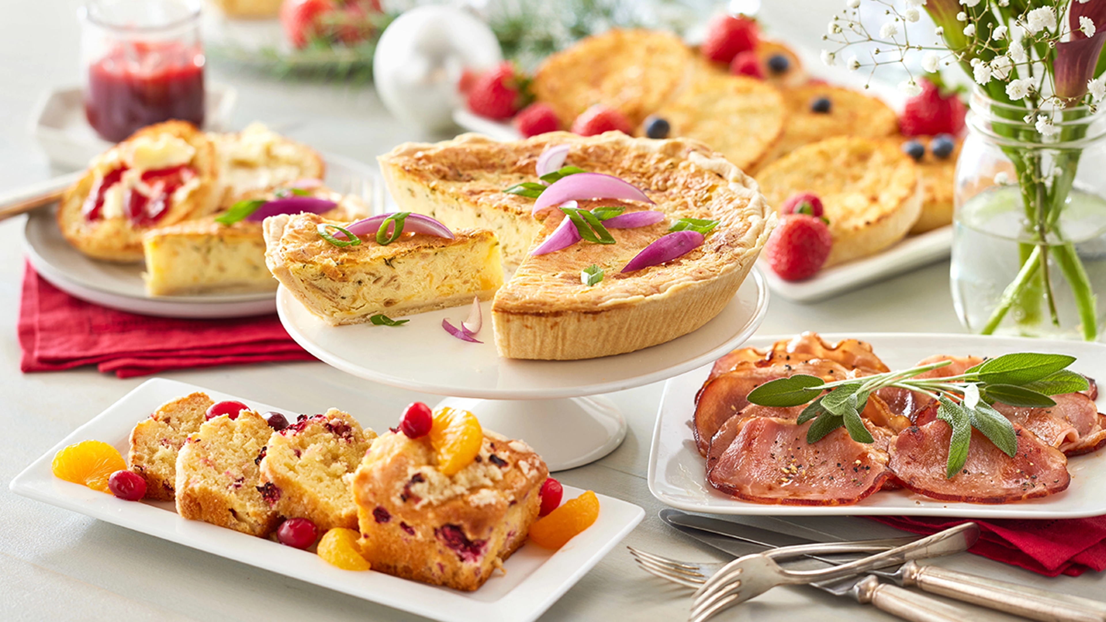 Spread of breakfast foods on a table.