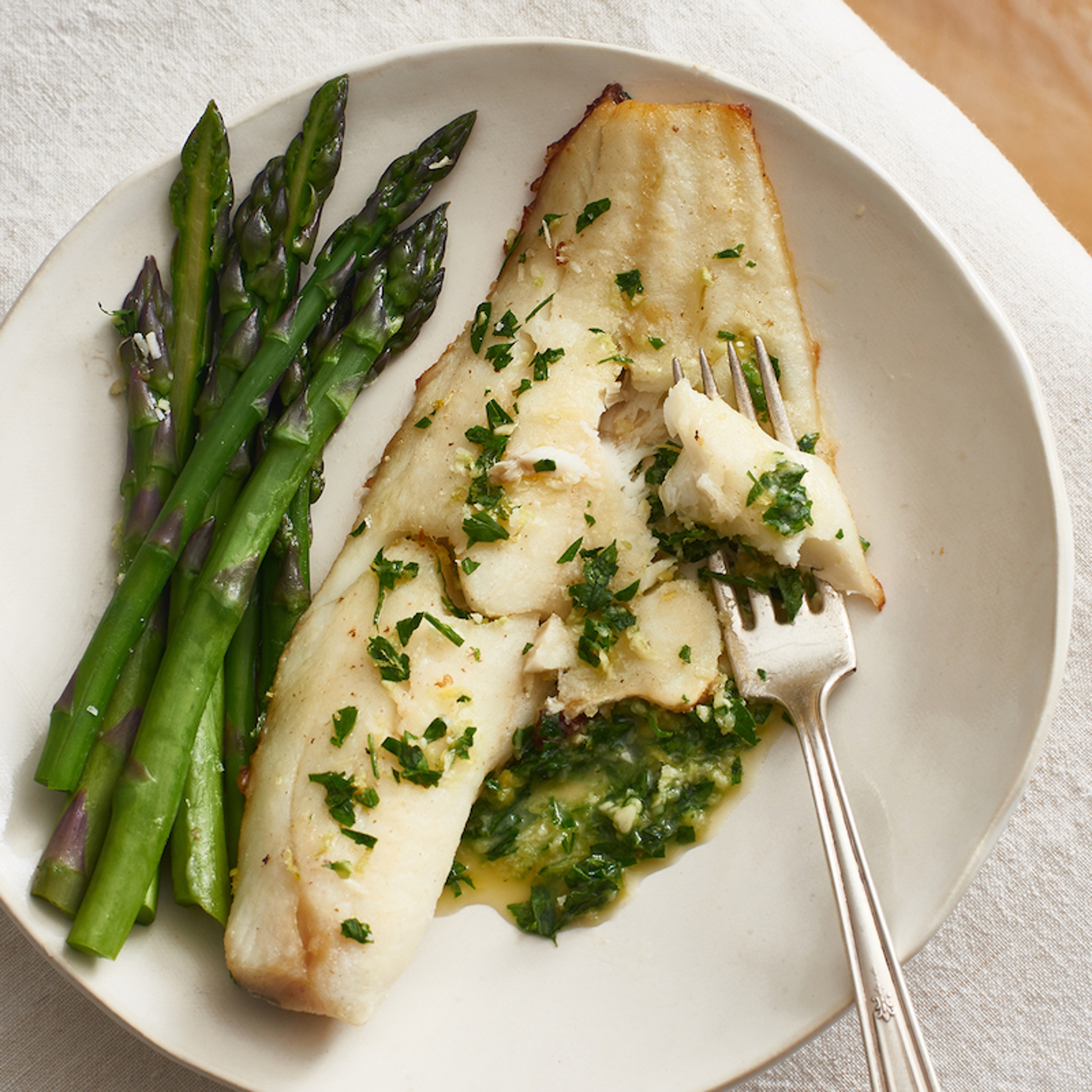 Baked haddock minus crispy crust makes a lovely low carb meal.