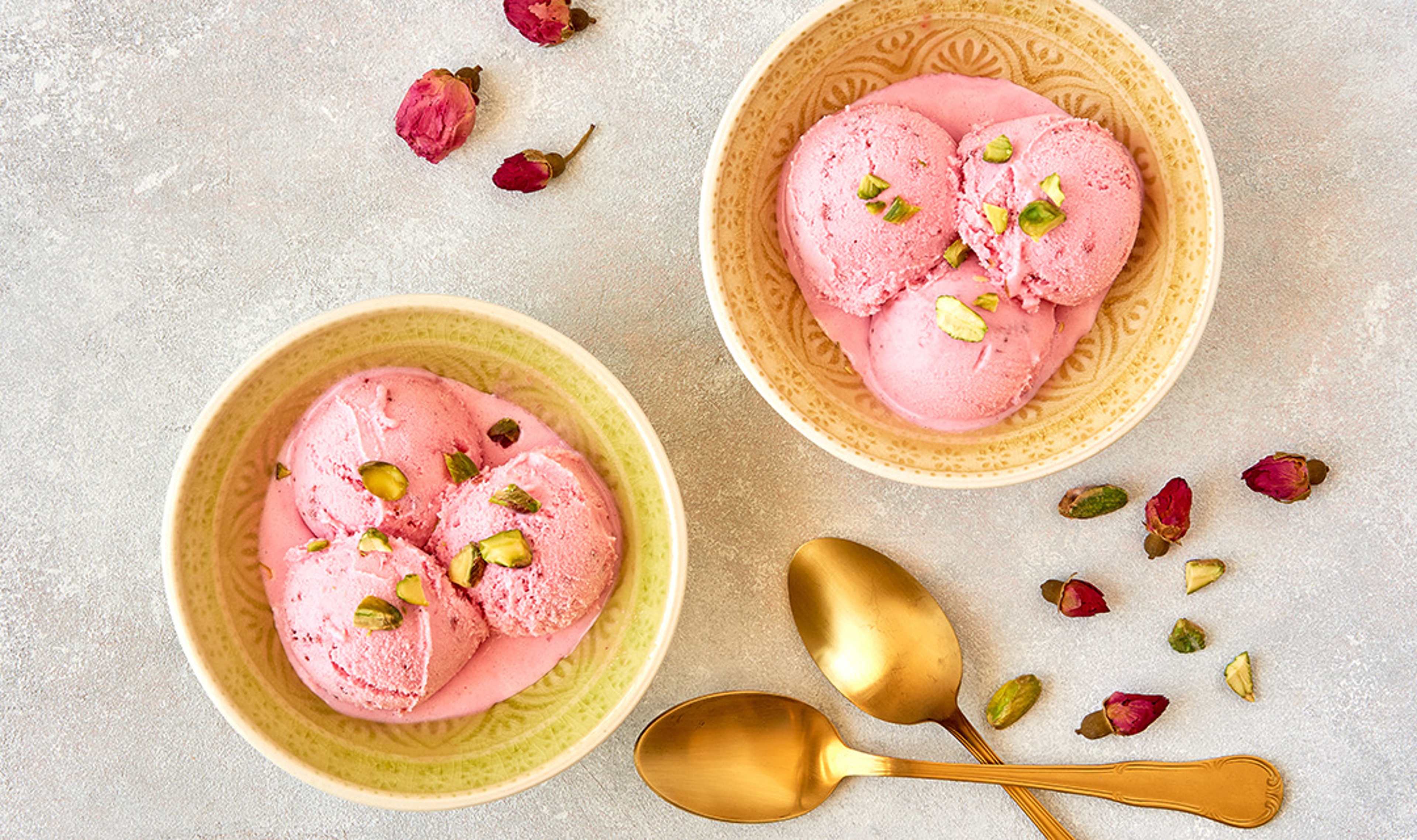 Article Cards Featured Image Strawberry rosewater ice cream , frozen yogurt with pistachio and rosebud. Top view