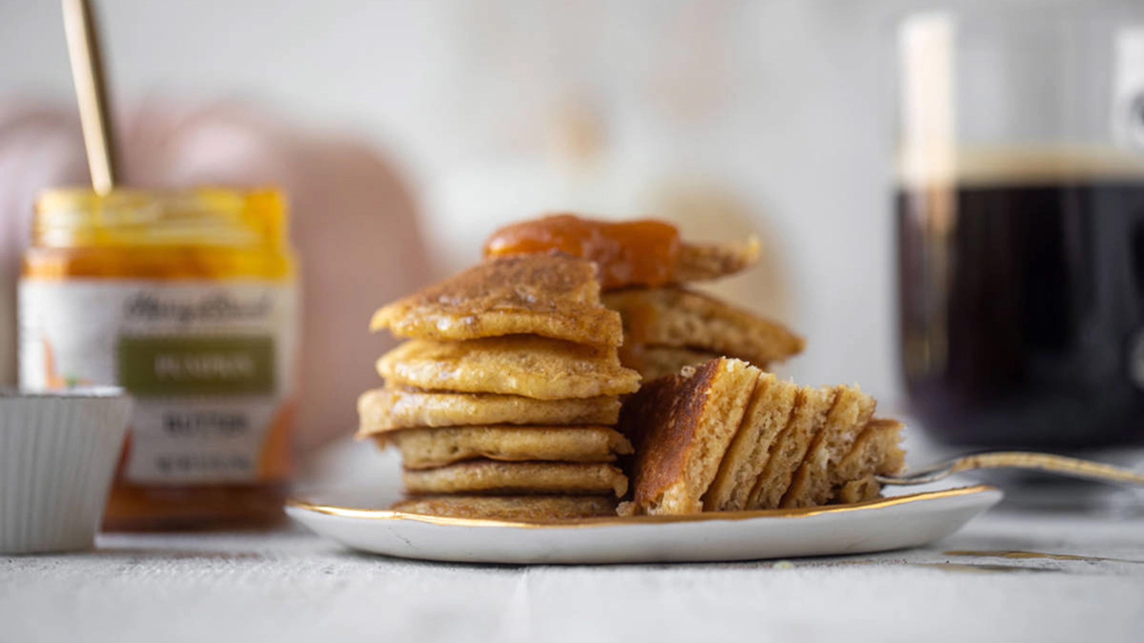 Plate with a stack of pumpkin pancakes.