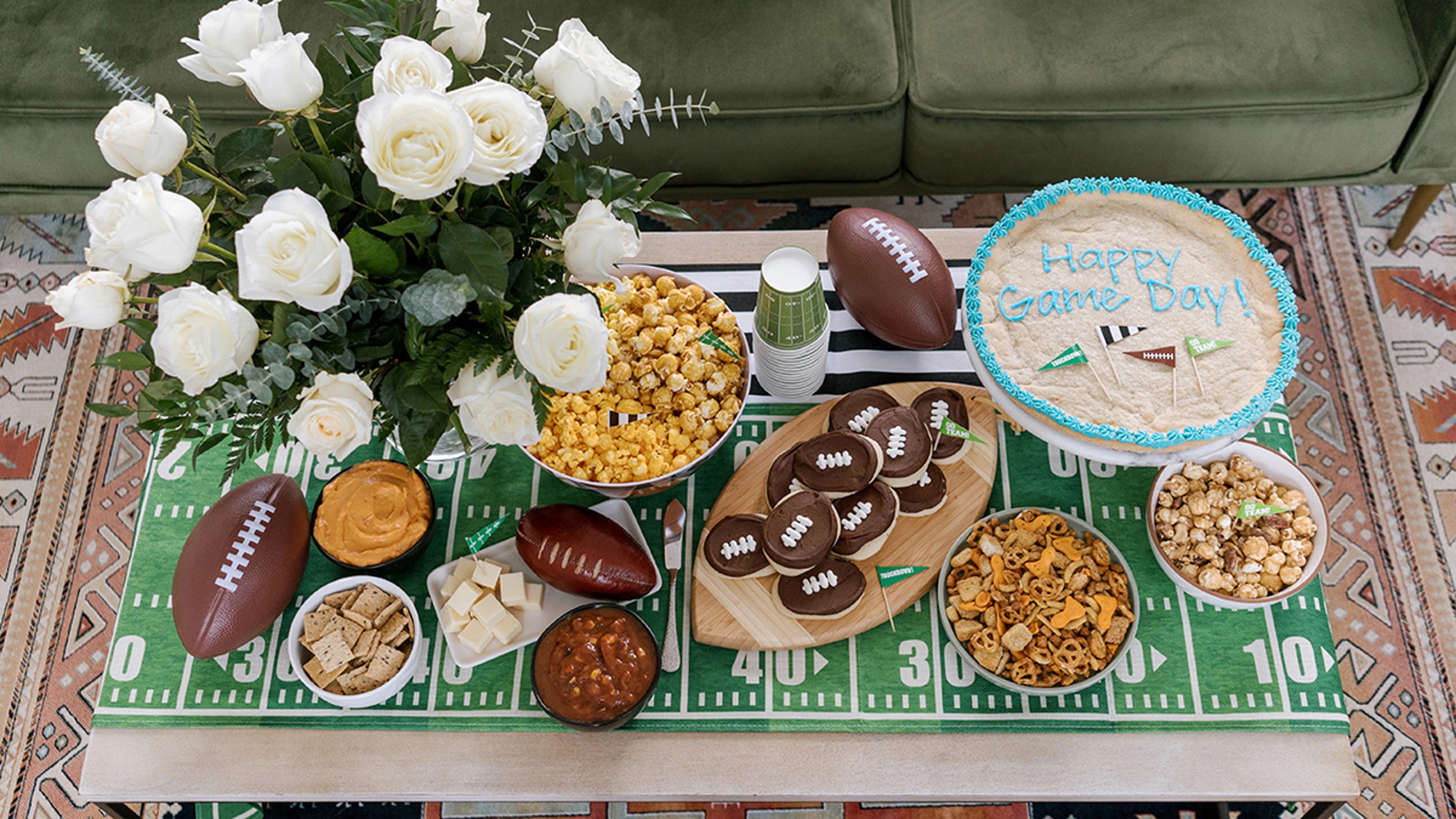 Tailgating essentials laid out on a coffee table.