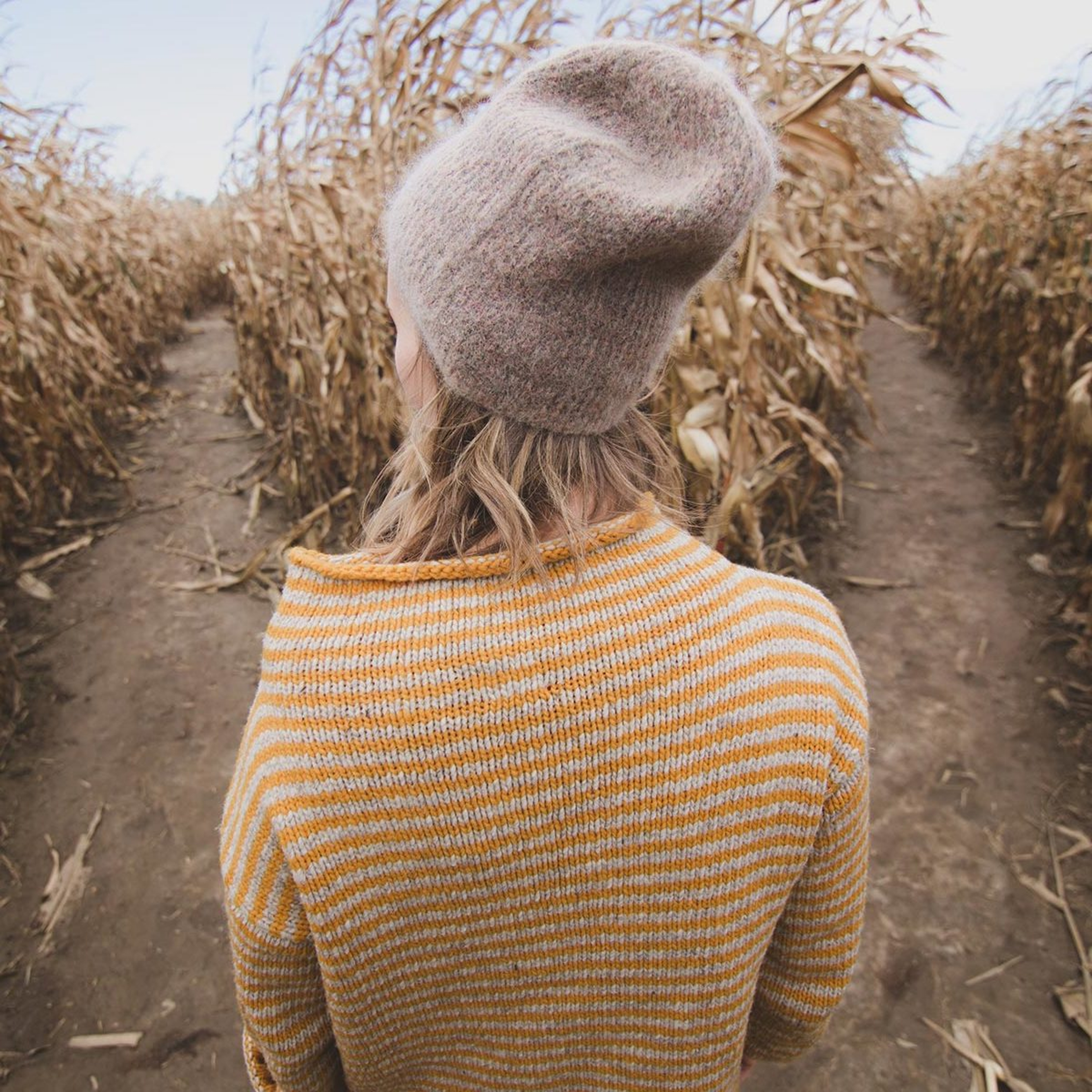Article Cards Featured Image Woman in corn maze