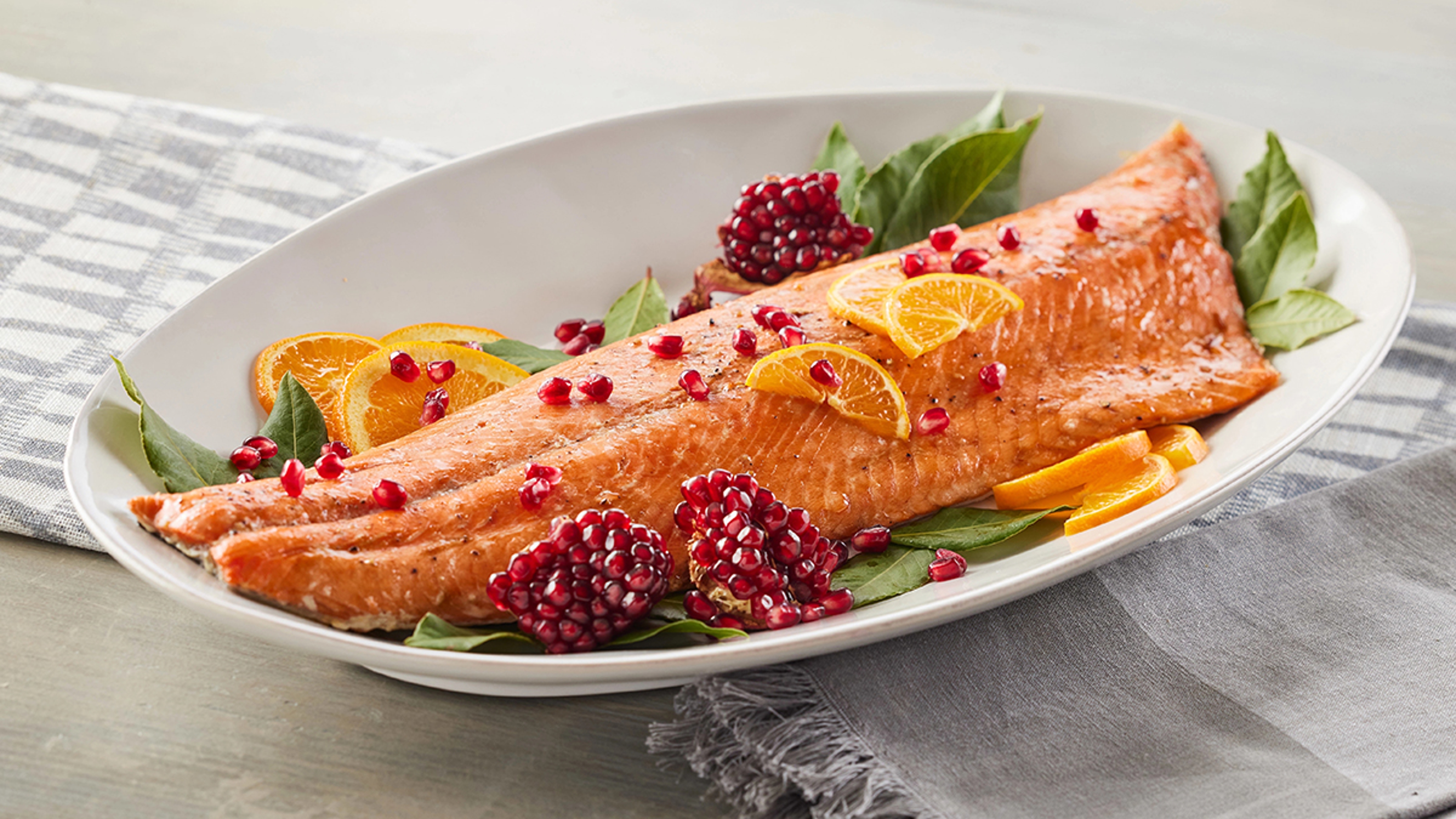 Bristol Bay sockeye salmon in a dish with fruit.