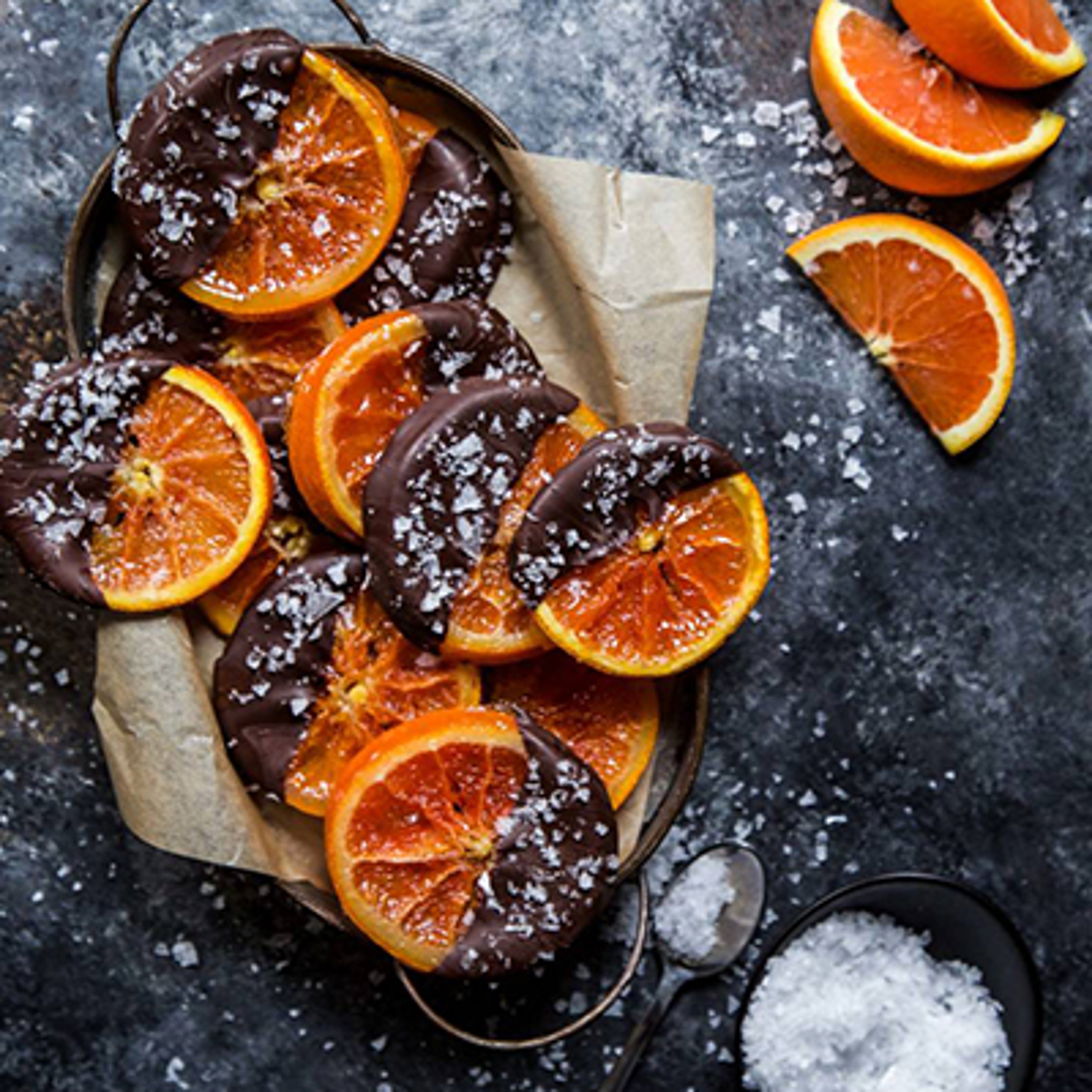 Candied Cara Cara orange slices dipped in chocolate.