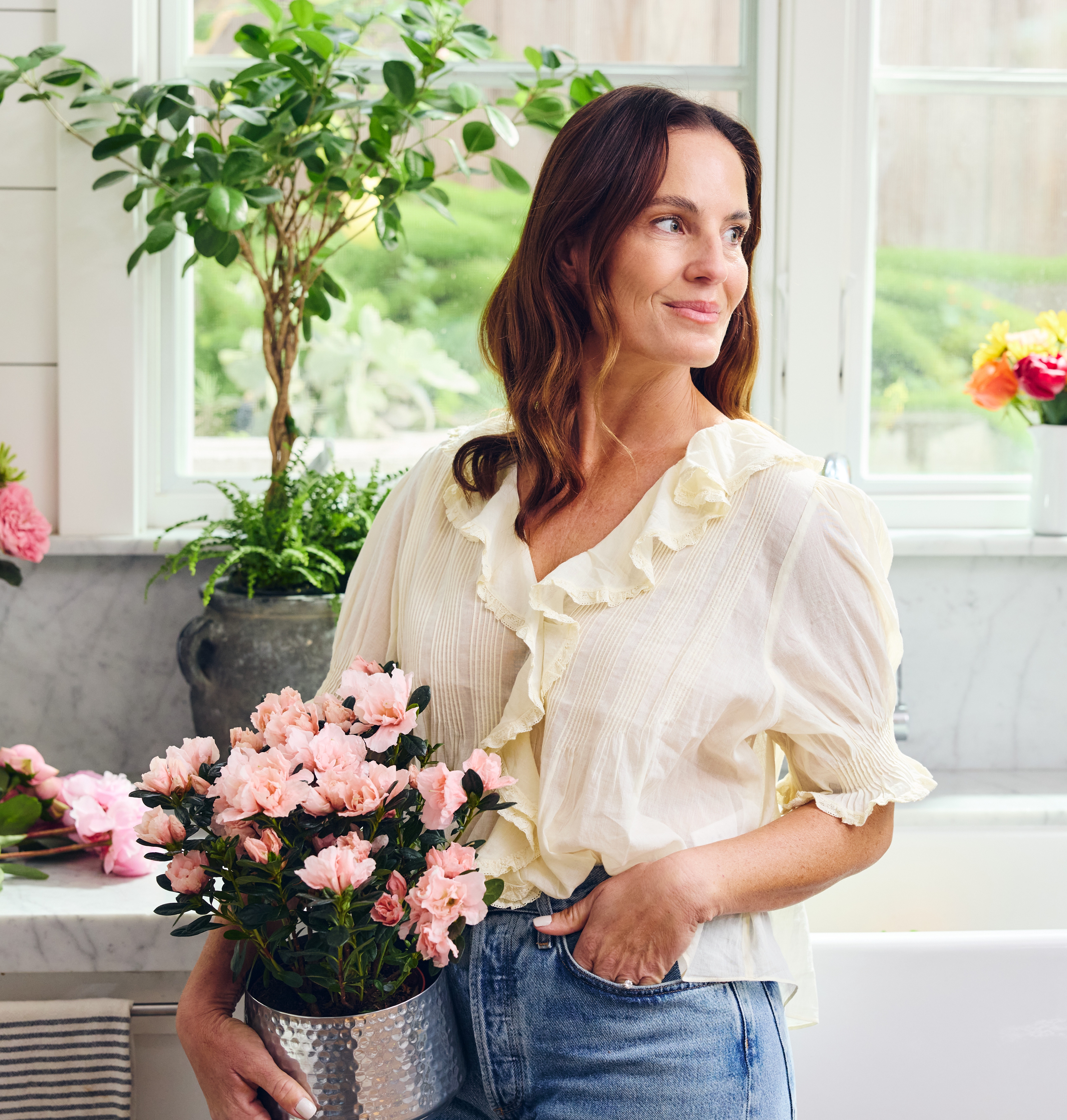 Jacquelyn Kazas with pink roses photo