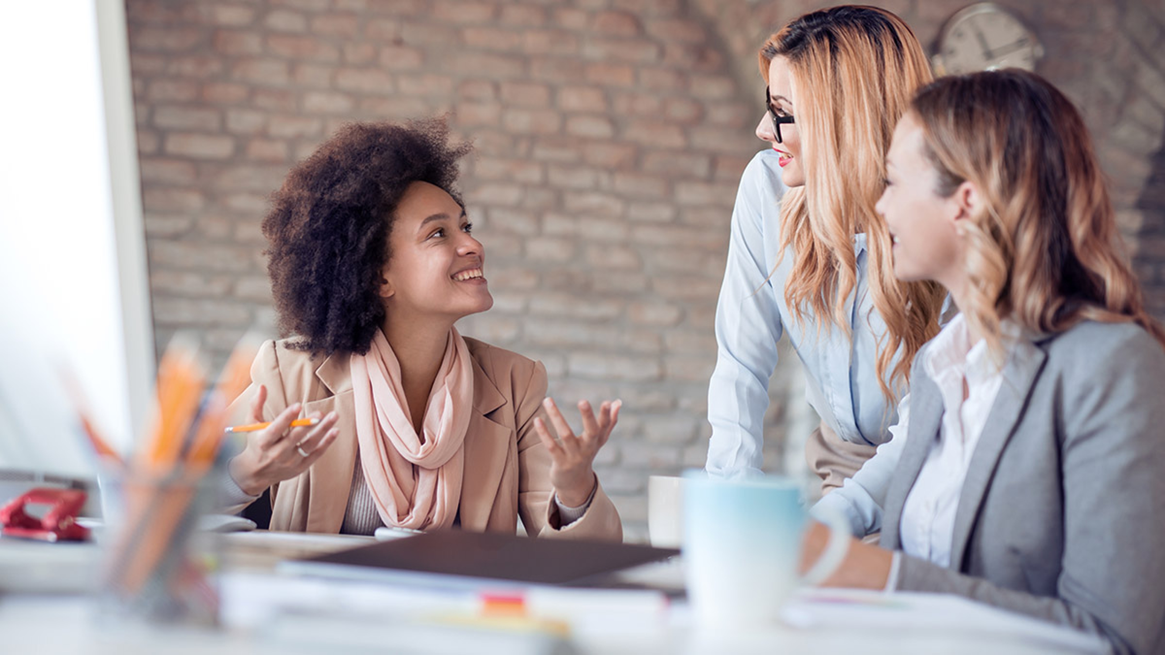 Women working in an office.