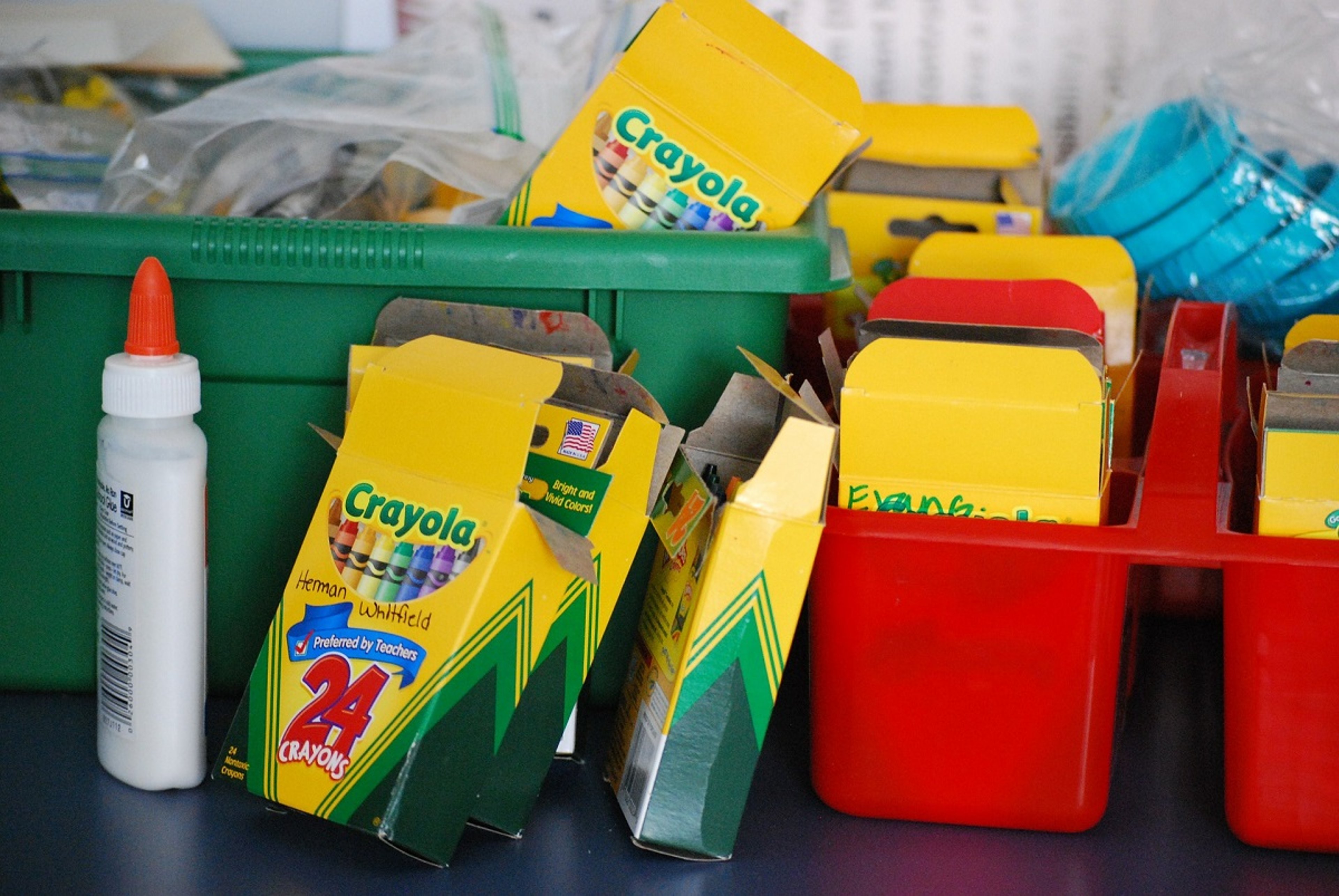 Classroom School supplies in boxes and buckets
