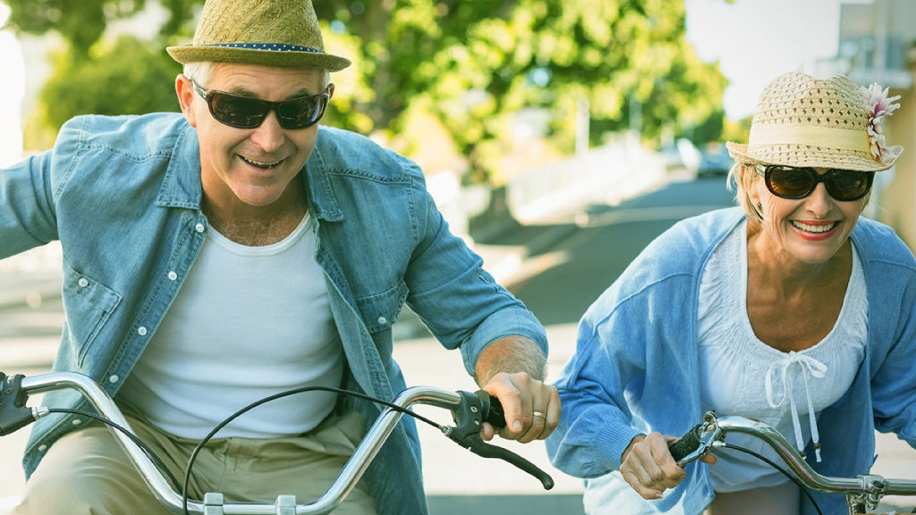 ways to show you care older couple bike riding side by side