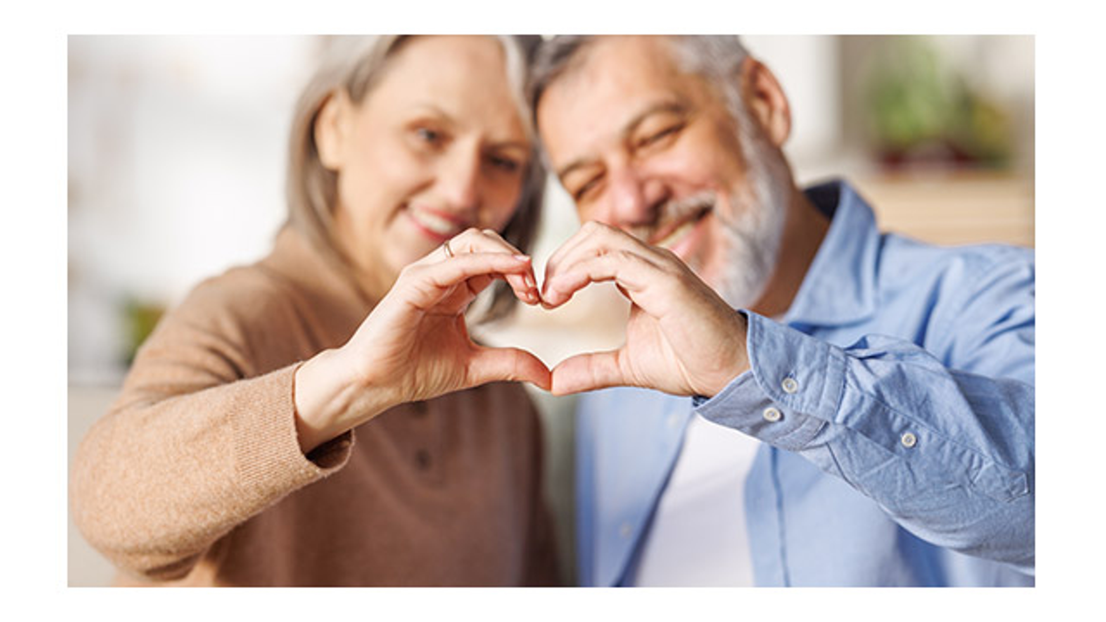 people making heart gesture with hands