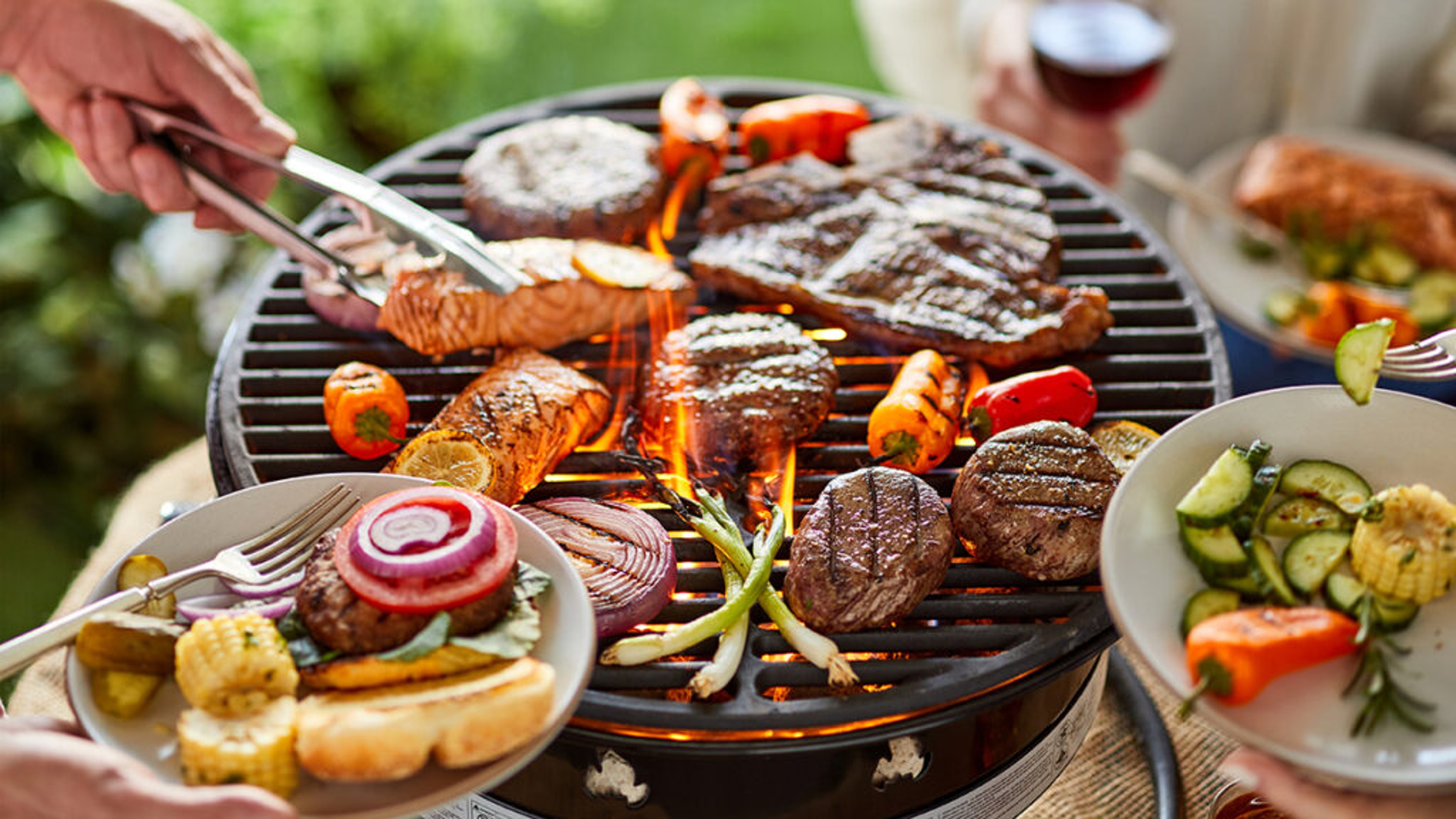 Spring break ideas with a grill full of meat, fish, and vegetables.