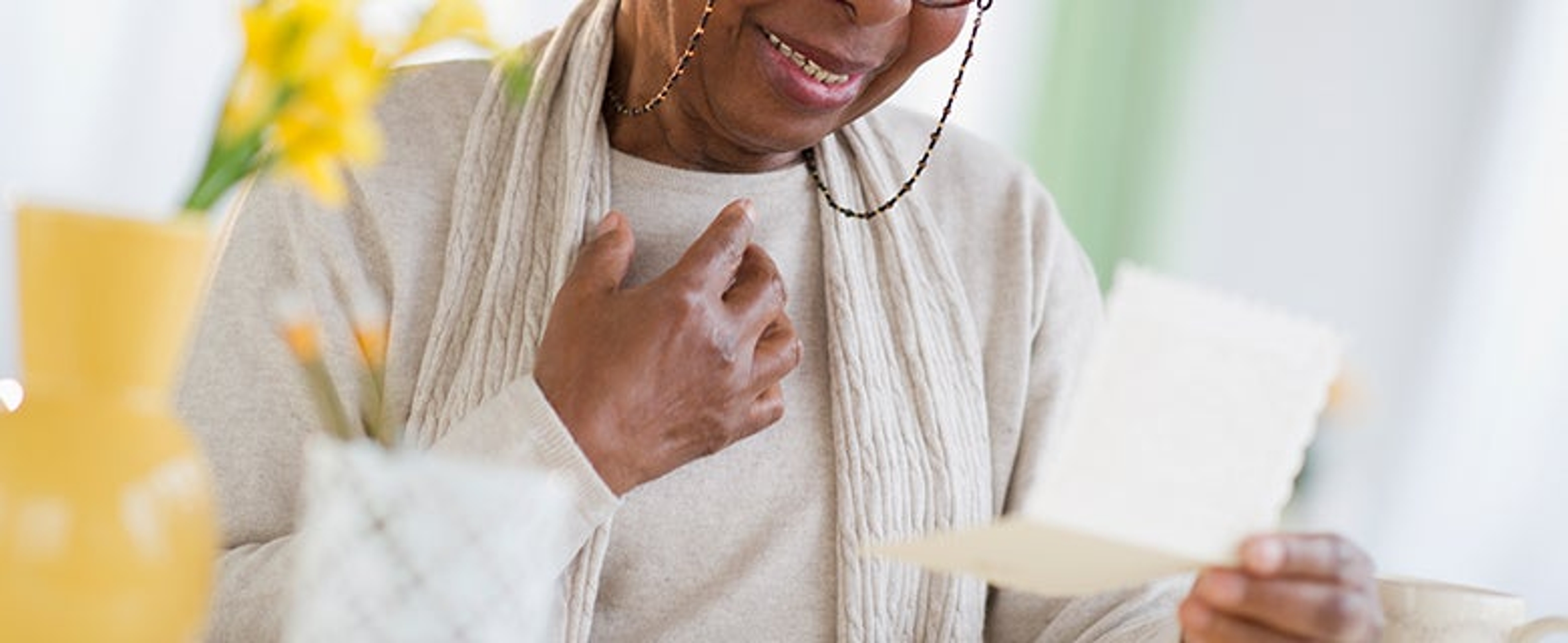 Article Cards Featured Image Photo of a woman receiving well wishes after an illness