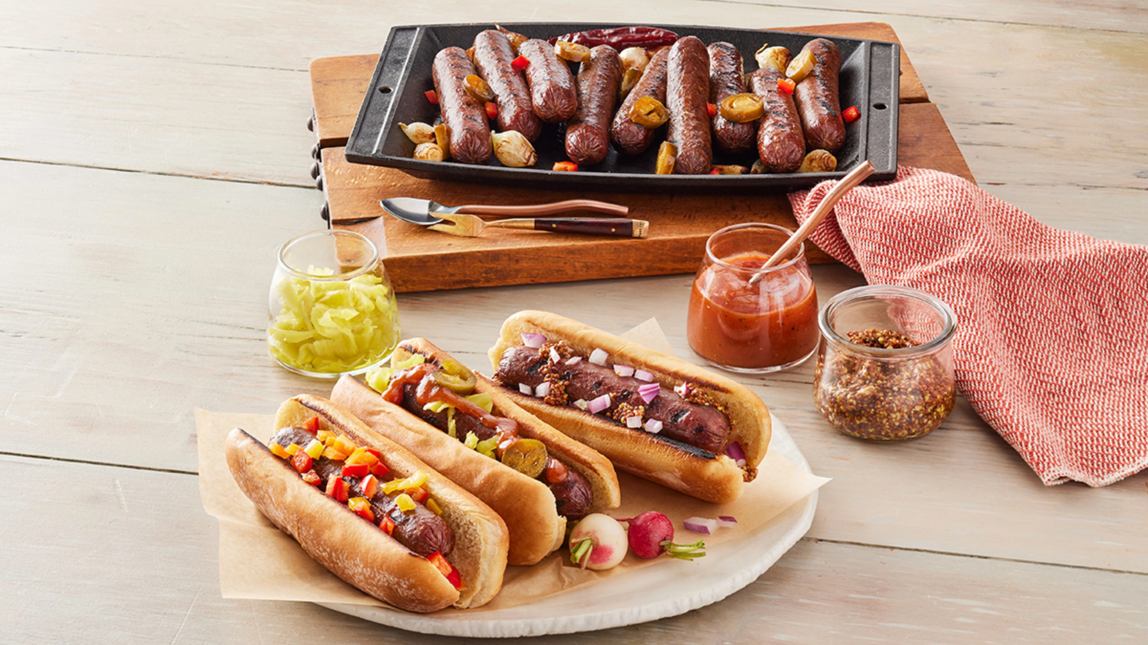 Fourth of July hot dogs with condiments.