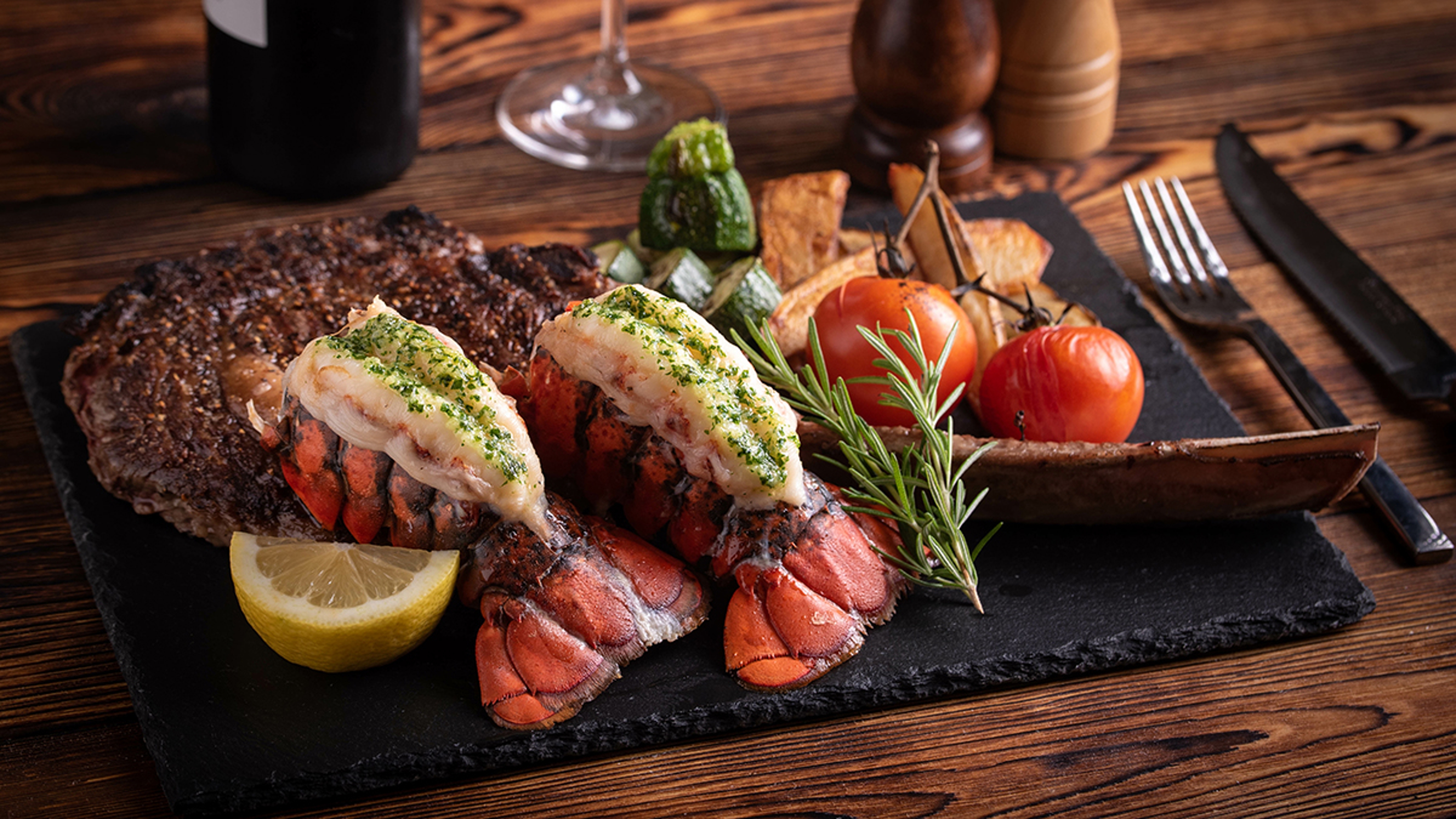 Article Cards Featured Image surf and turf with tomahawk rib eye steak and lobster tail