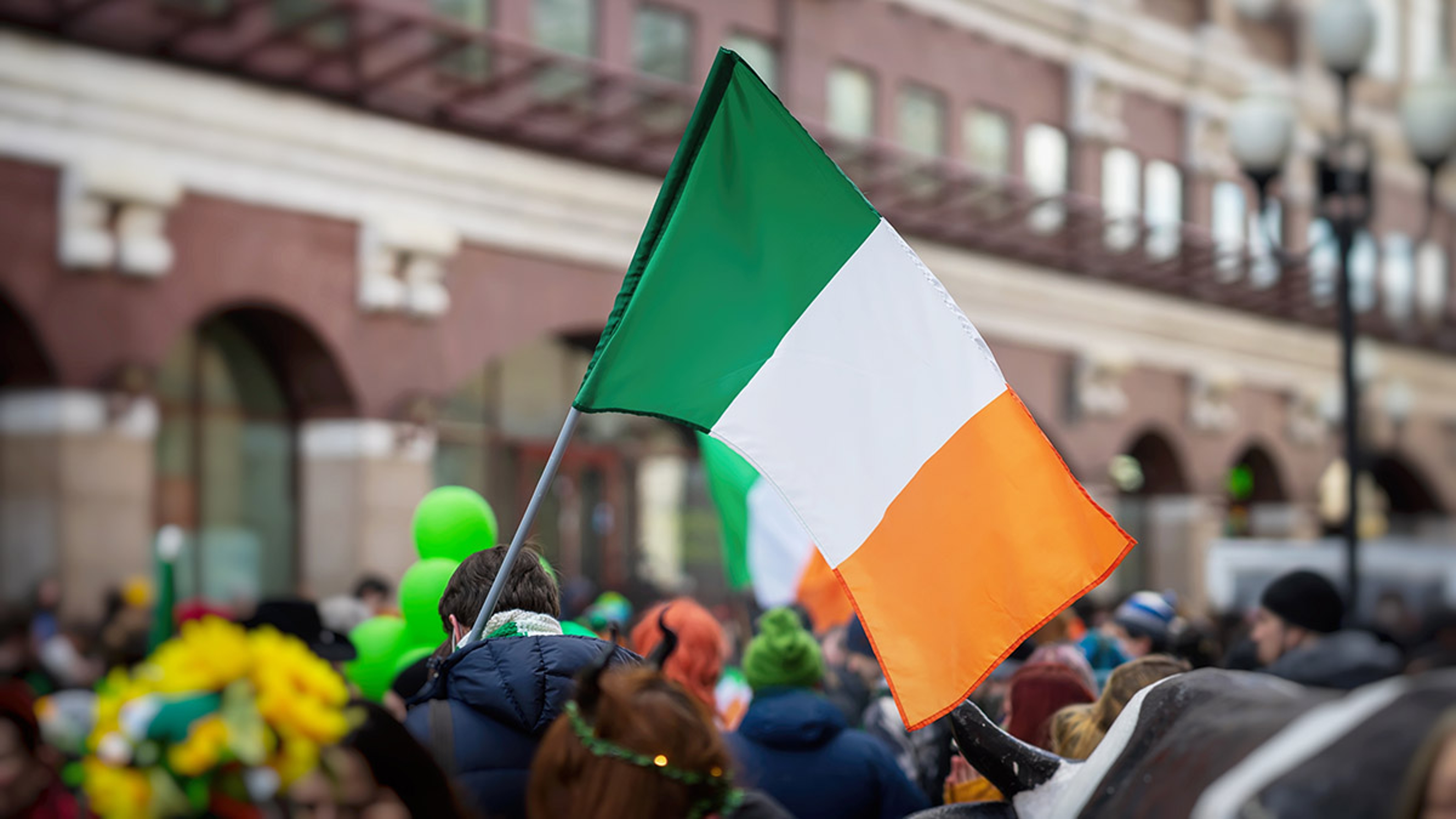 Article Cards Featured Image irish flag at parade