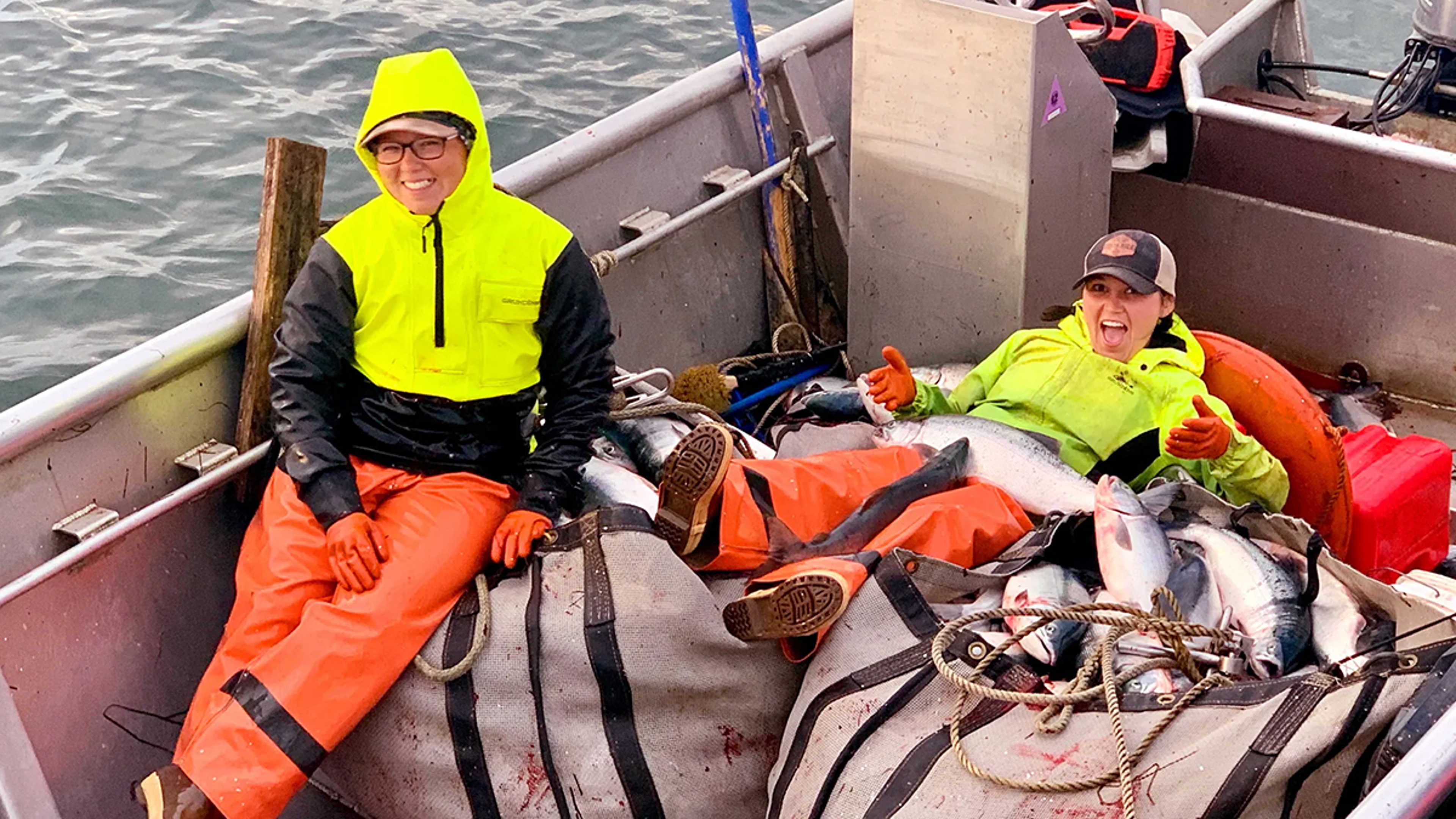 Stevie Wilbur and sister on a fishing boat