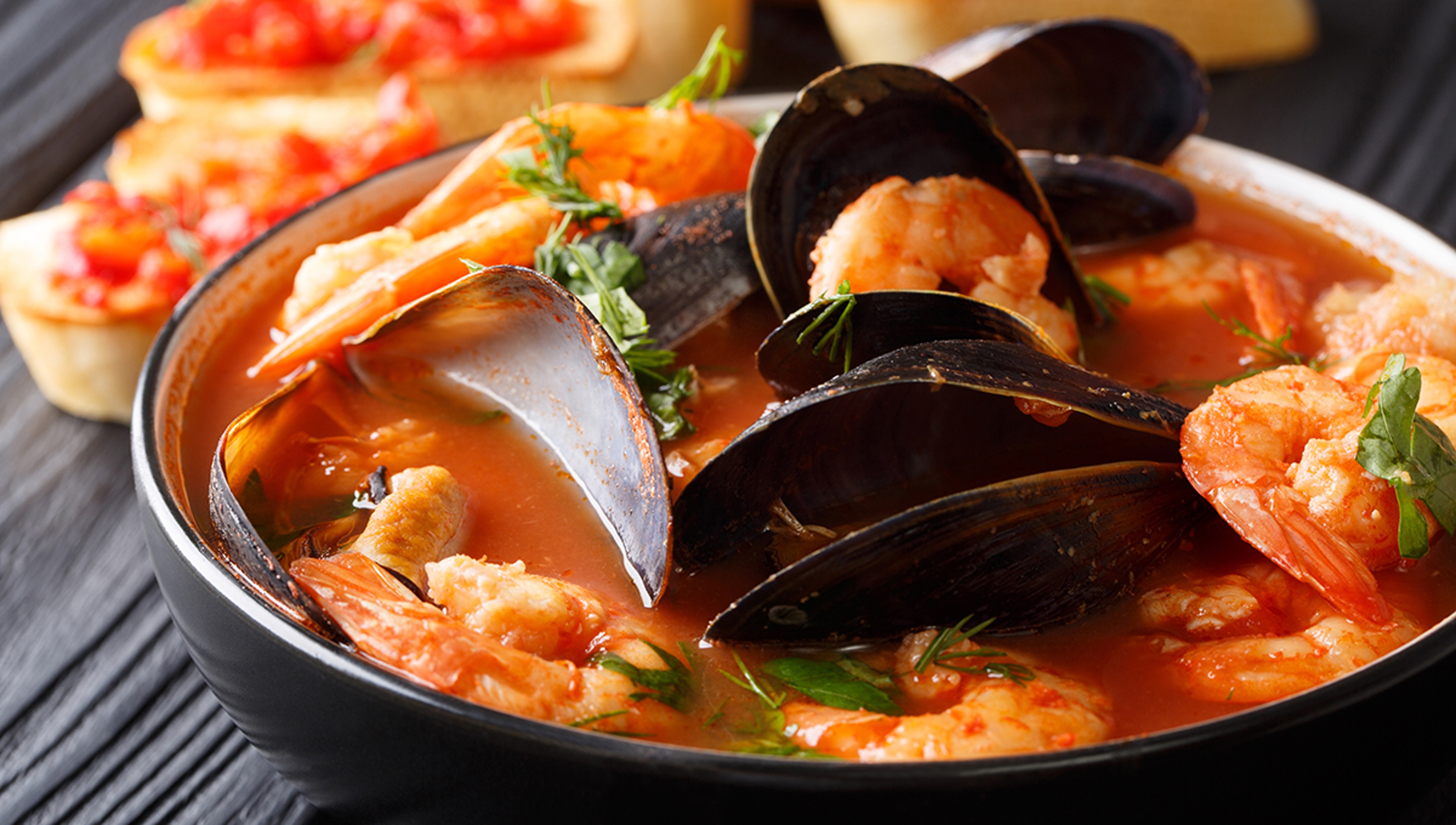 Article Cards Featured Image Freshly cooked seafood bouillabaisse soup with shrimps, fish fil