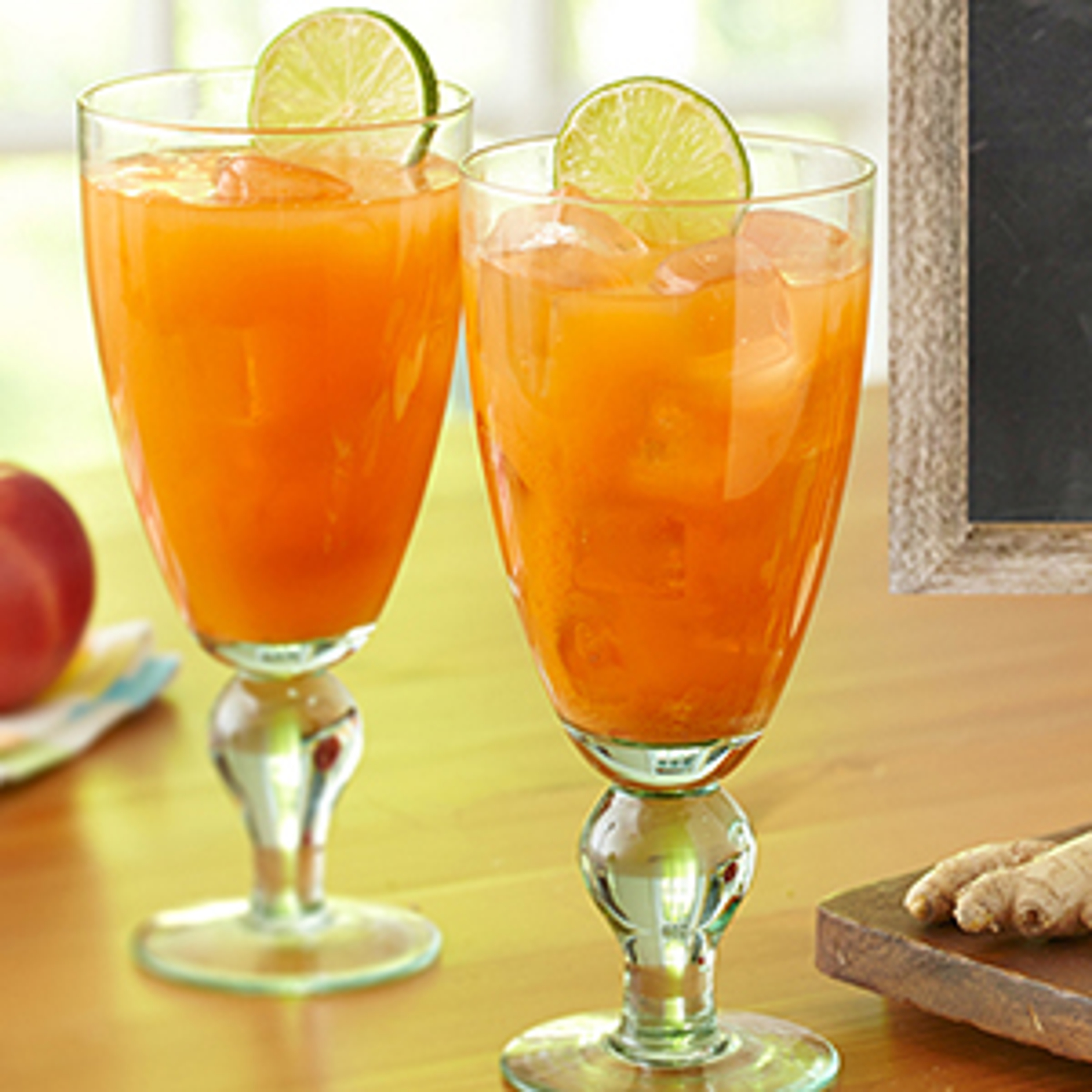 Carrot juice cocktails in two glasses.