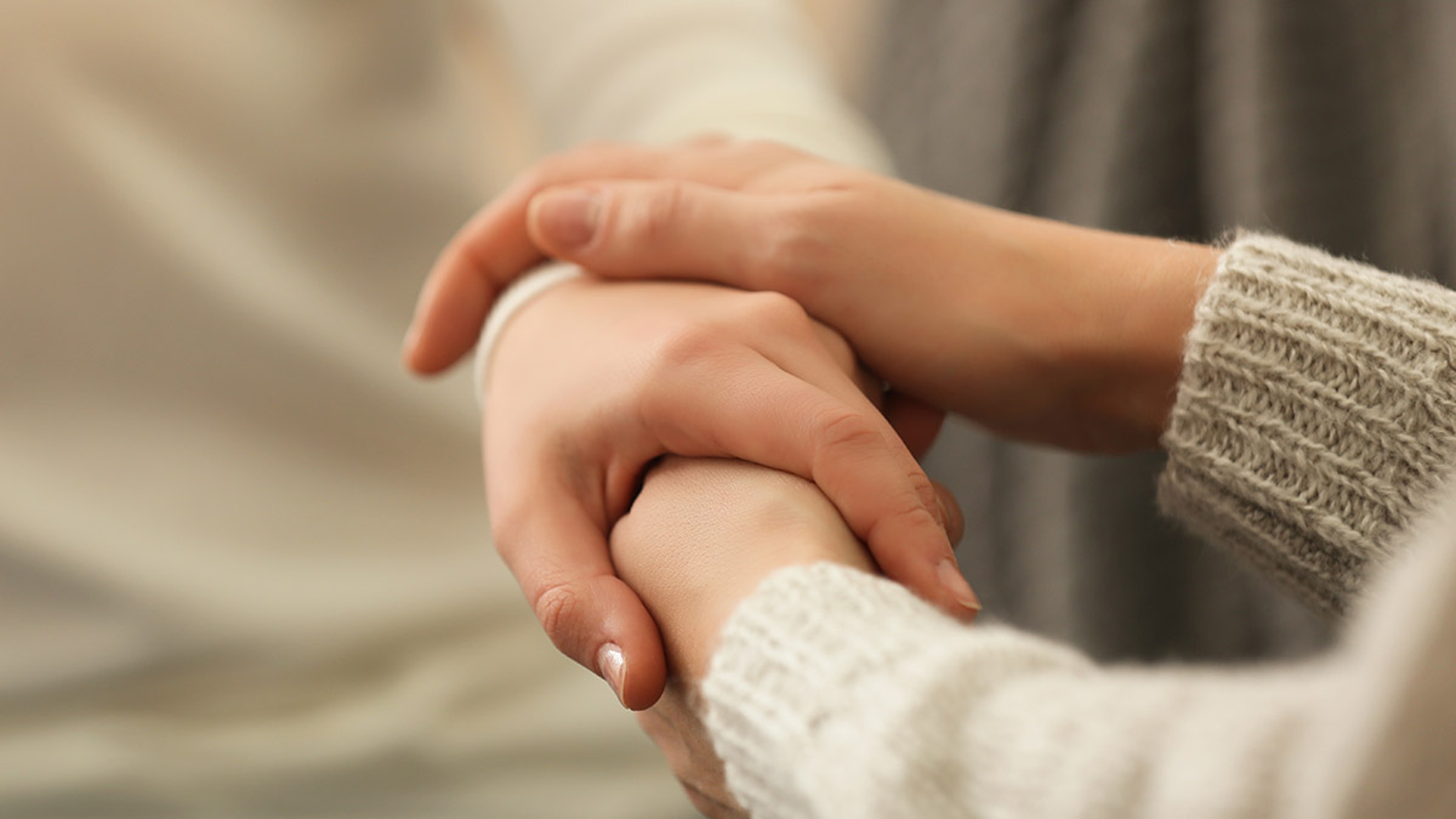 Article Cards Featured Image Hands of young woman countenancing depressed friend, closeup