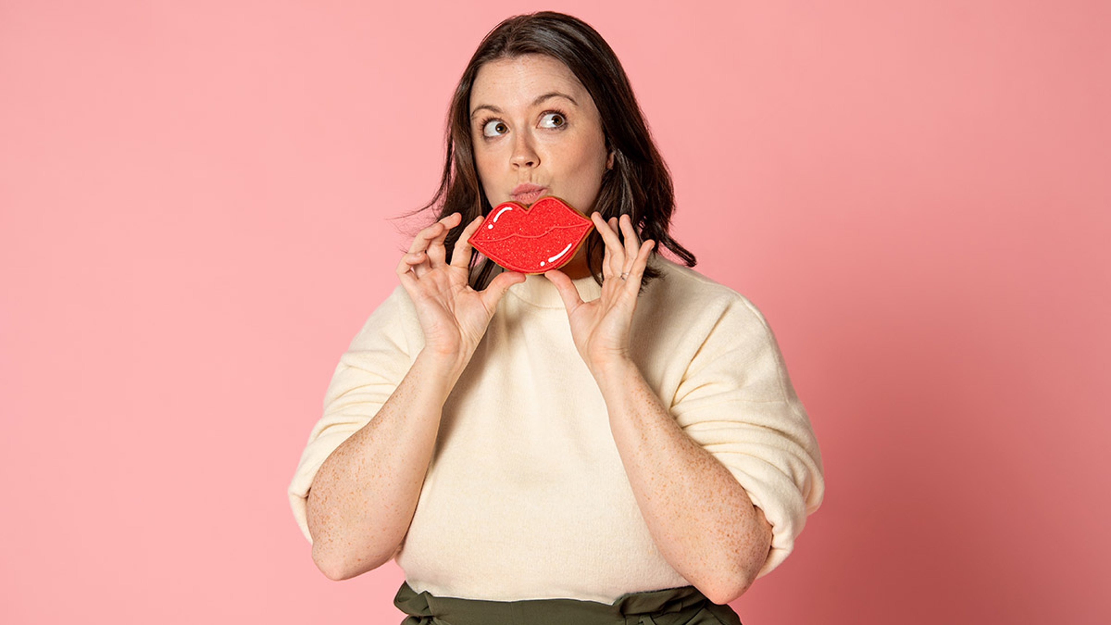 Article Cards Featured Image valentines day puns woman with lips cookie