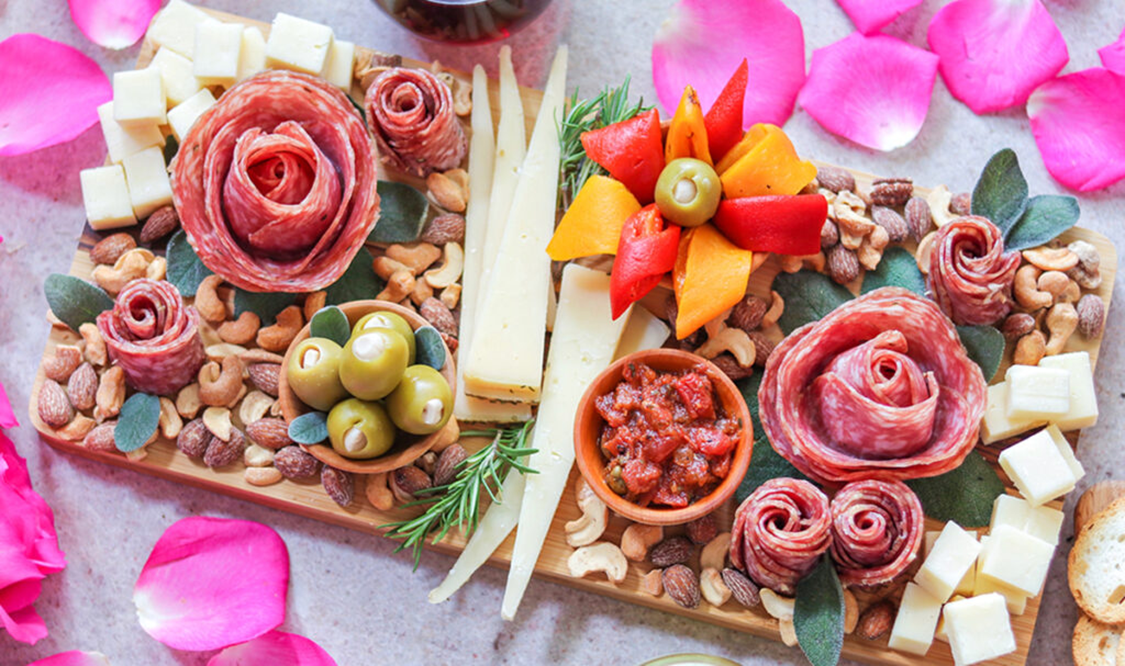 Spring break ideas with a charcuterie spread with flowers.