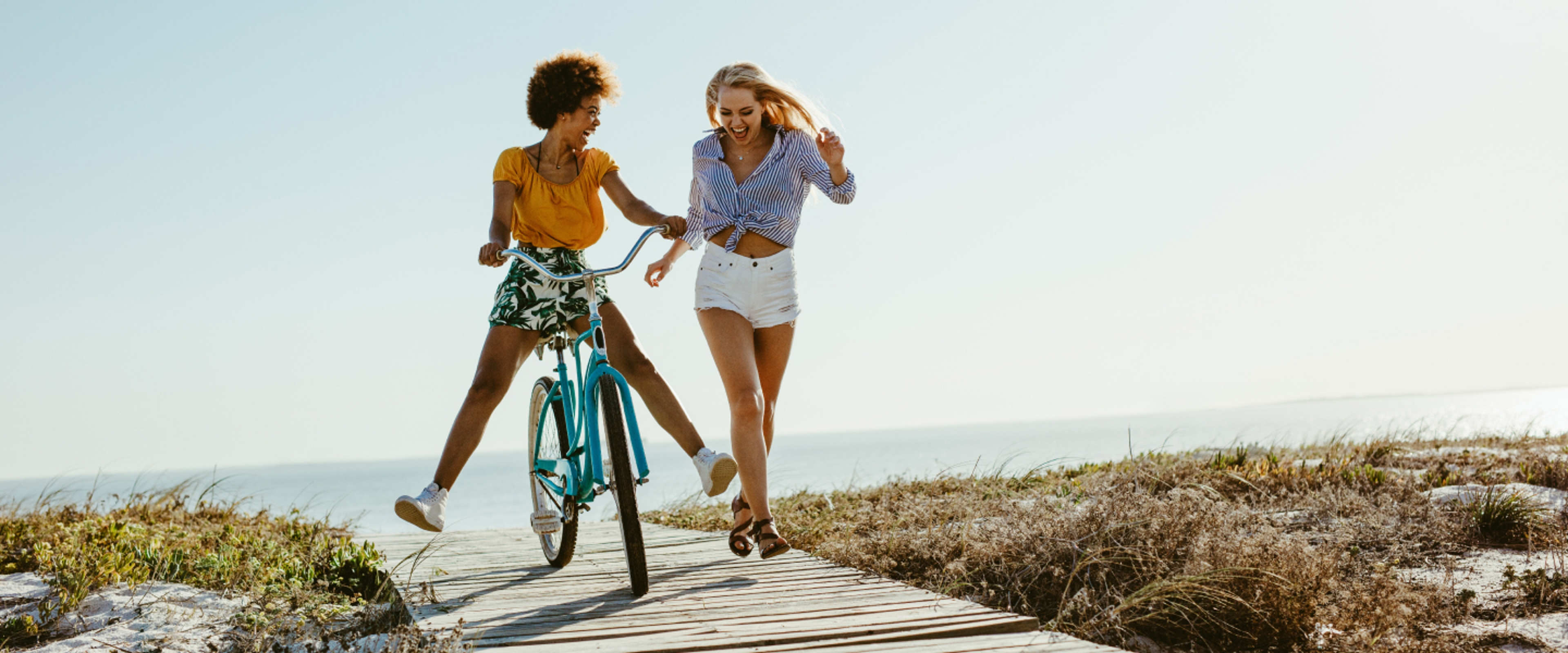 Article Cards Featured Image girl on bike and friend