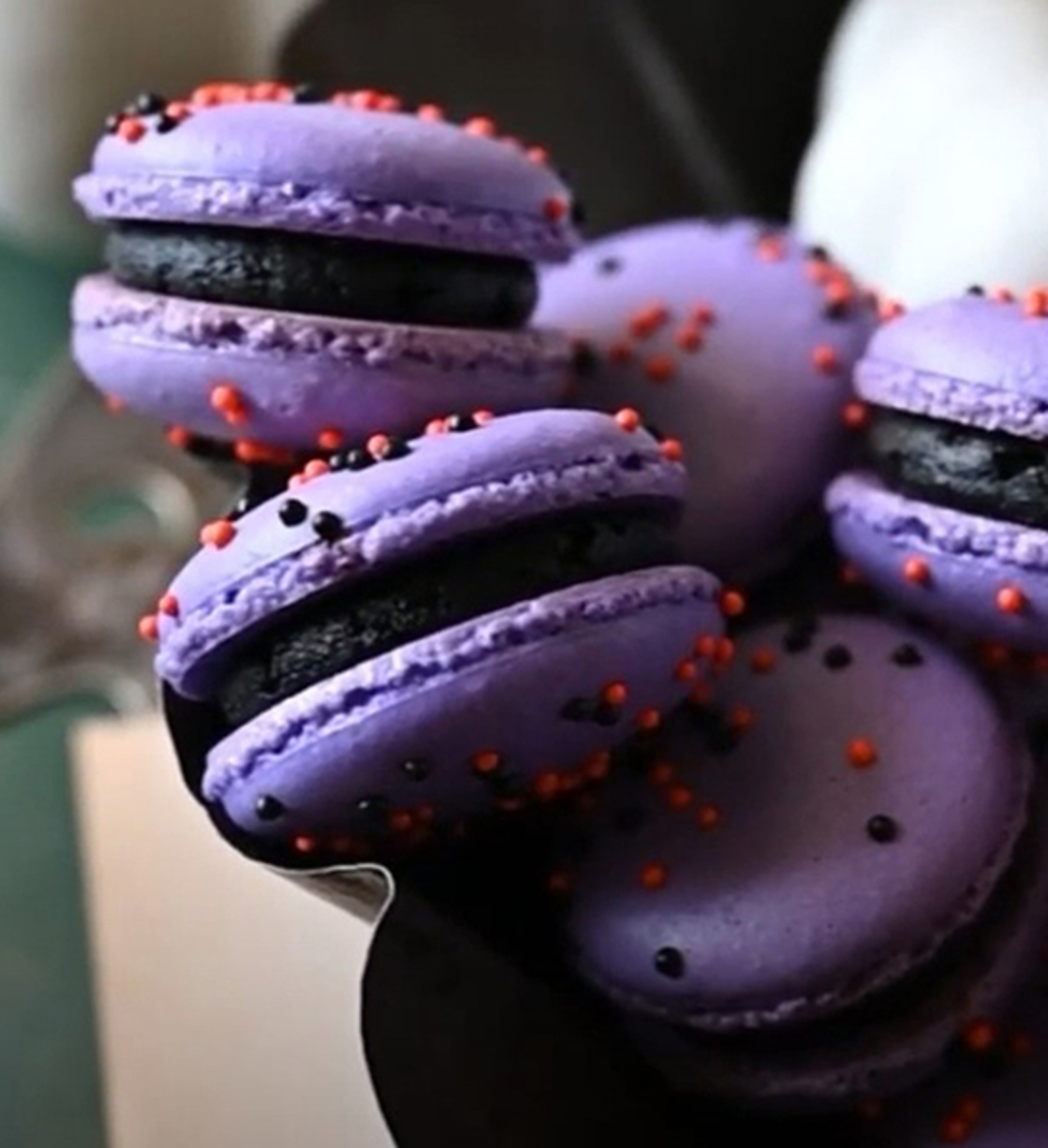 Purple macarons stacked.