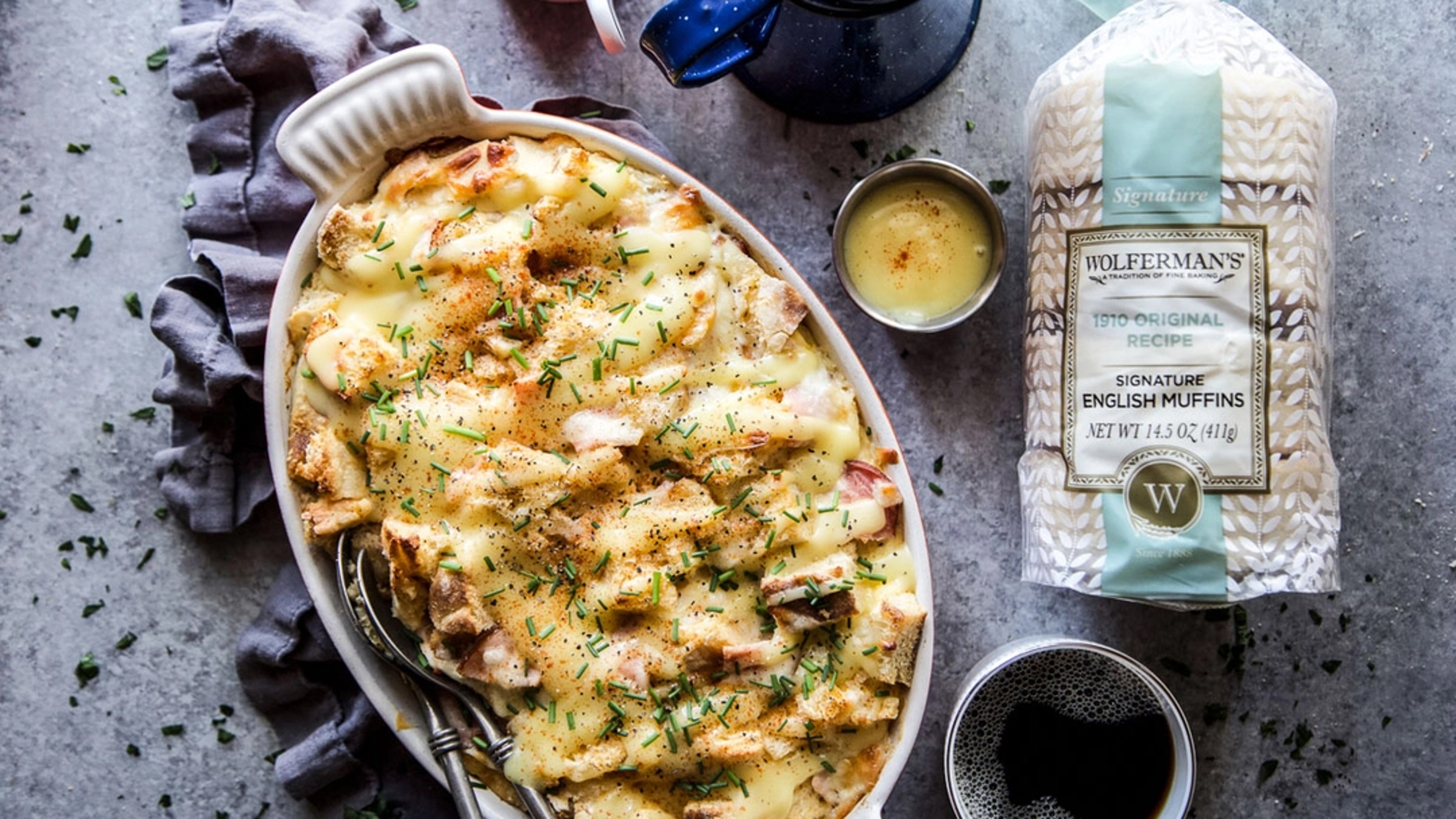 Eggs Benedict casserole next to a bag of English muffins