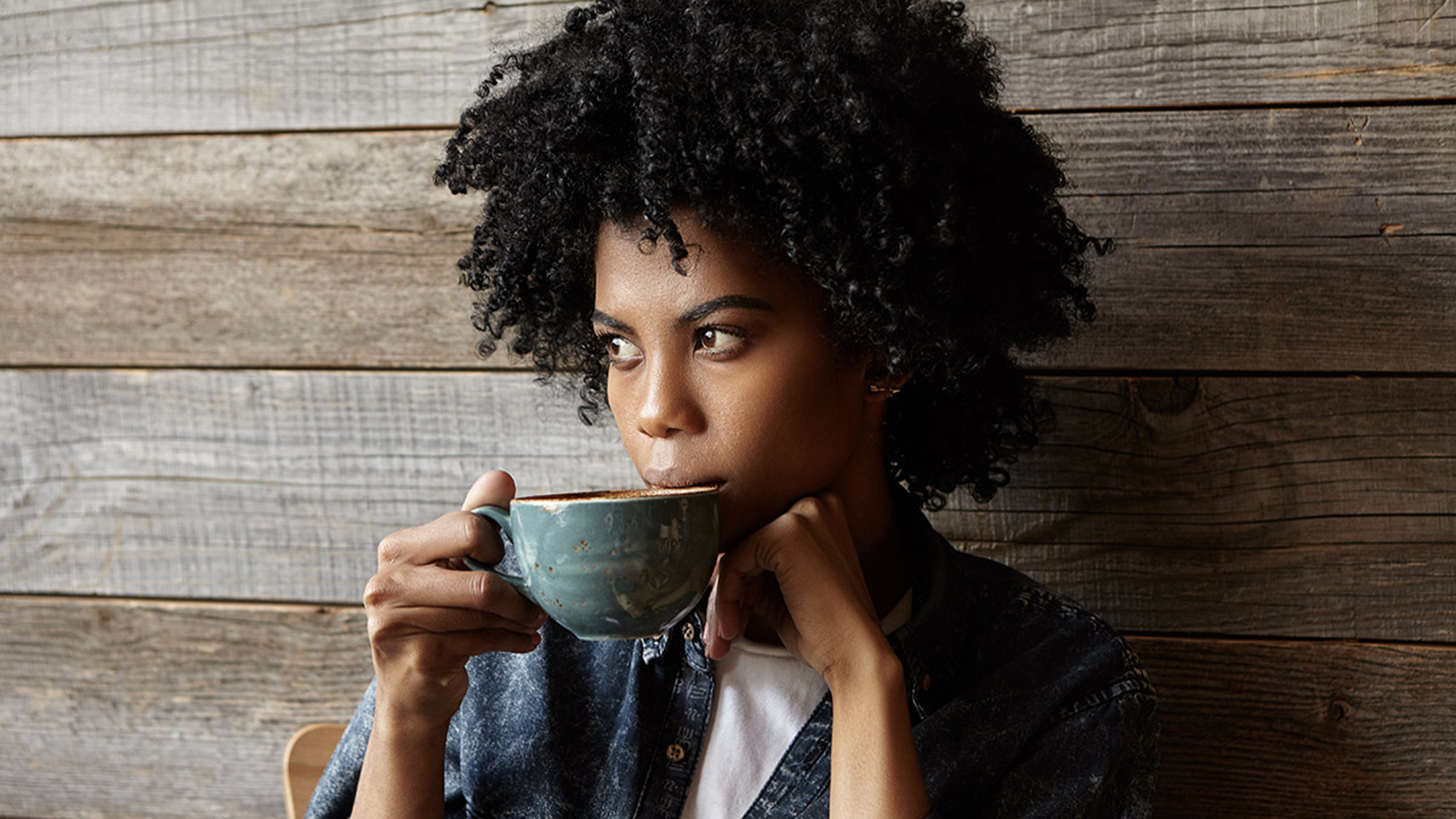 gifts for aquarius with woman drinking out of mug