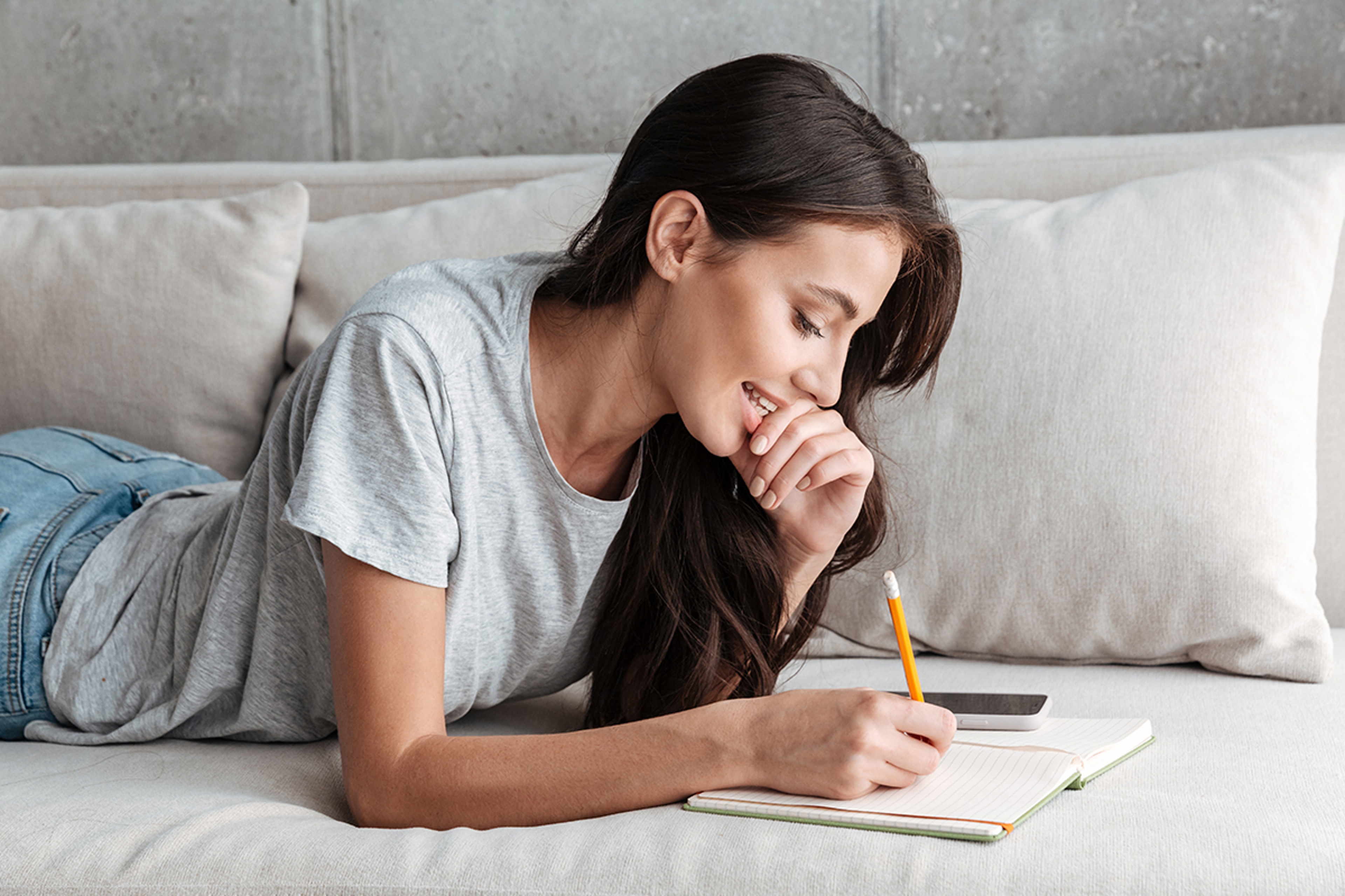 photo of woman writing to a pen pal