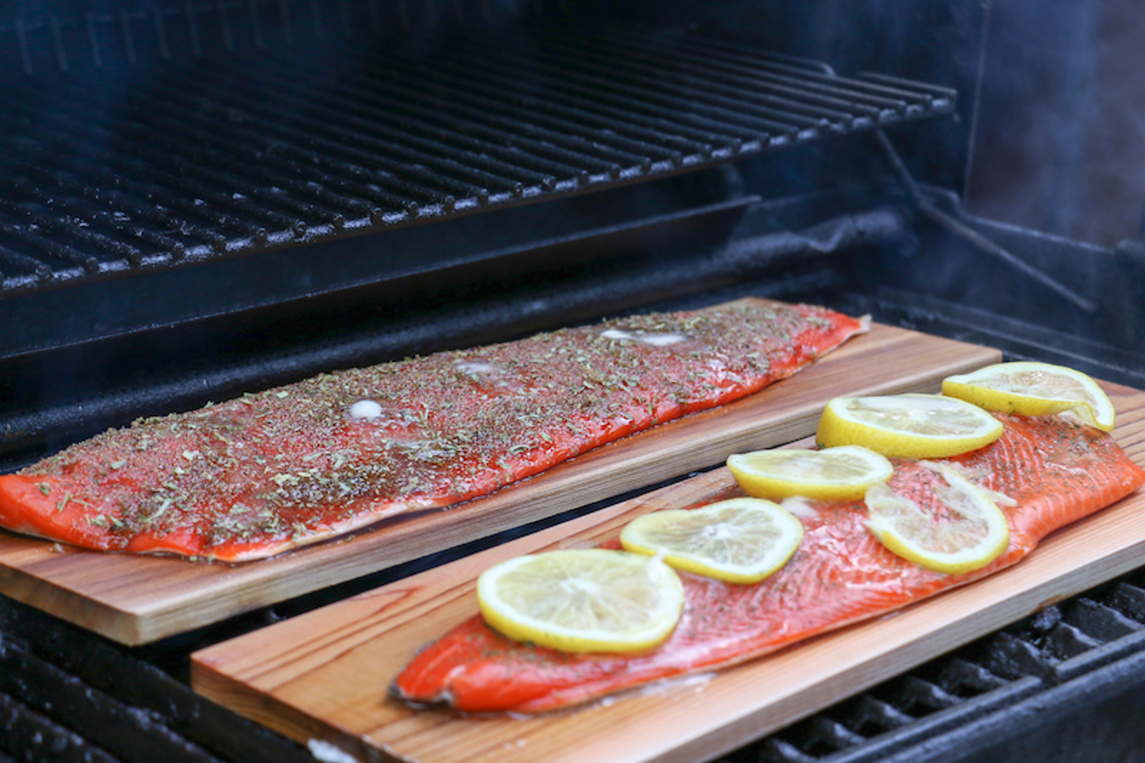 cedar plank grilling salmon sides on cedar planks in a grill