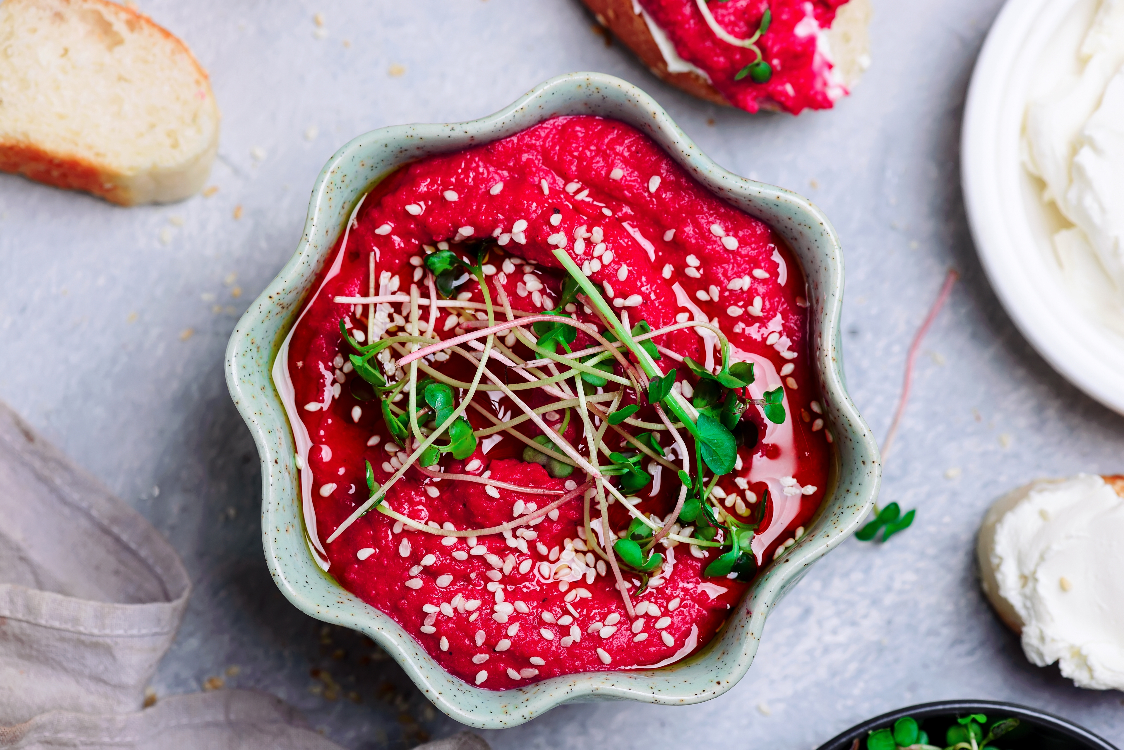 Beet recipes with a bowl of pink beet hummus.